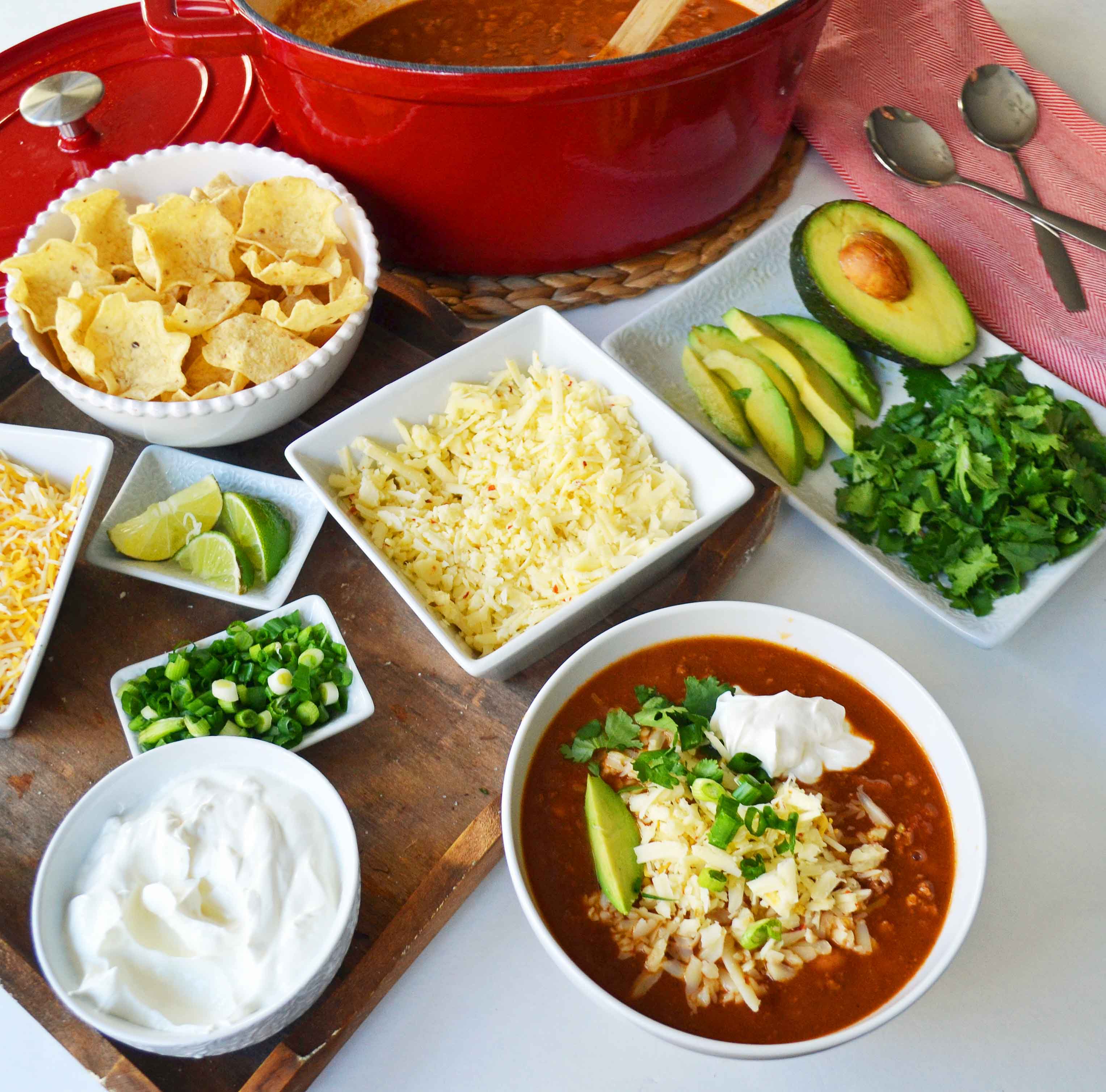 Texas Sized Chili Bar with Toppings. The best chili with two secret ingredients that make all the difference. www.modernhoney.com