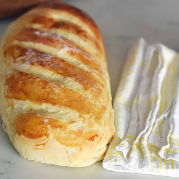 Easy Homemade Bakery French Bread. Quick and easy homemade french bread made at home. Kids can make this bread! Super easy to follow foolproof recipe. www.modernhoney.com