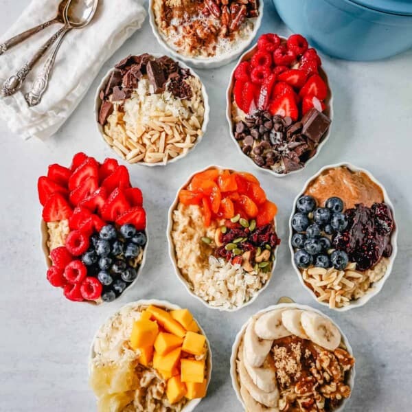 How to make creamy oatmeal with your favorite toppings combinations. I am sharing a list of all of the popular oatmeal toppings ideas to serve on a cold winter day and how to make the best bowl of oatmeal!