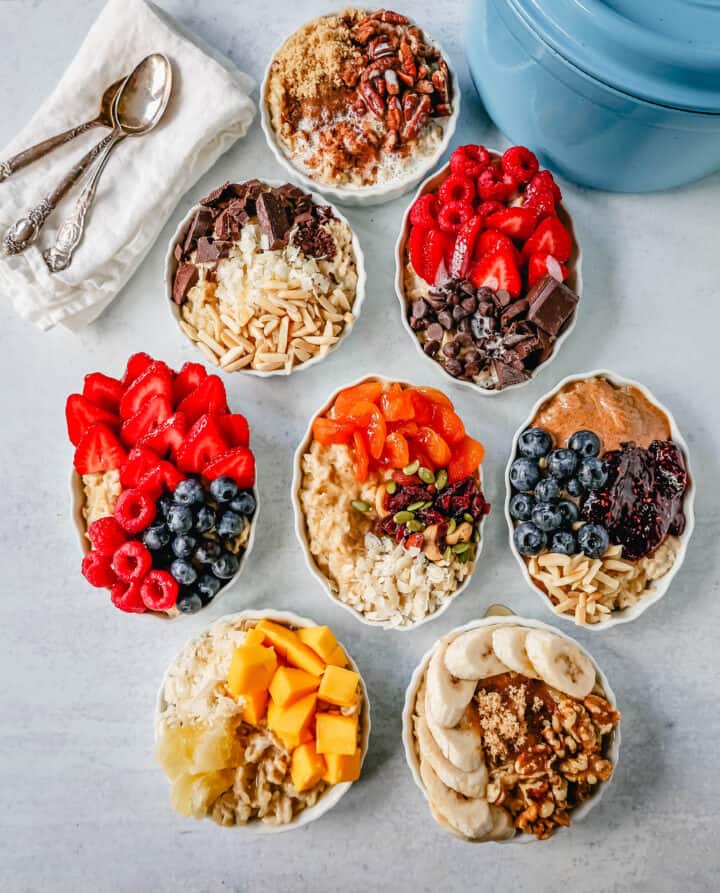 How to make creamy oatmeal with your favorite toppings combinations. I am sharing a list of all of the popular oatmeal toppings ideas to serve on a cold winter day and how to make the best bowl of oatmeal!