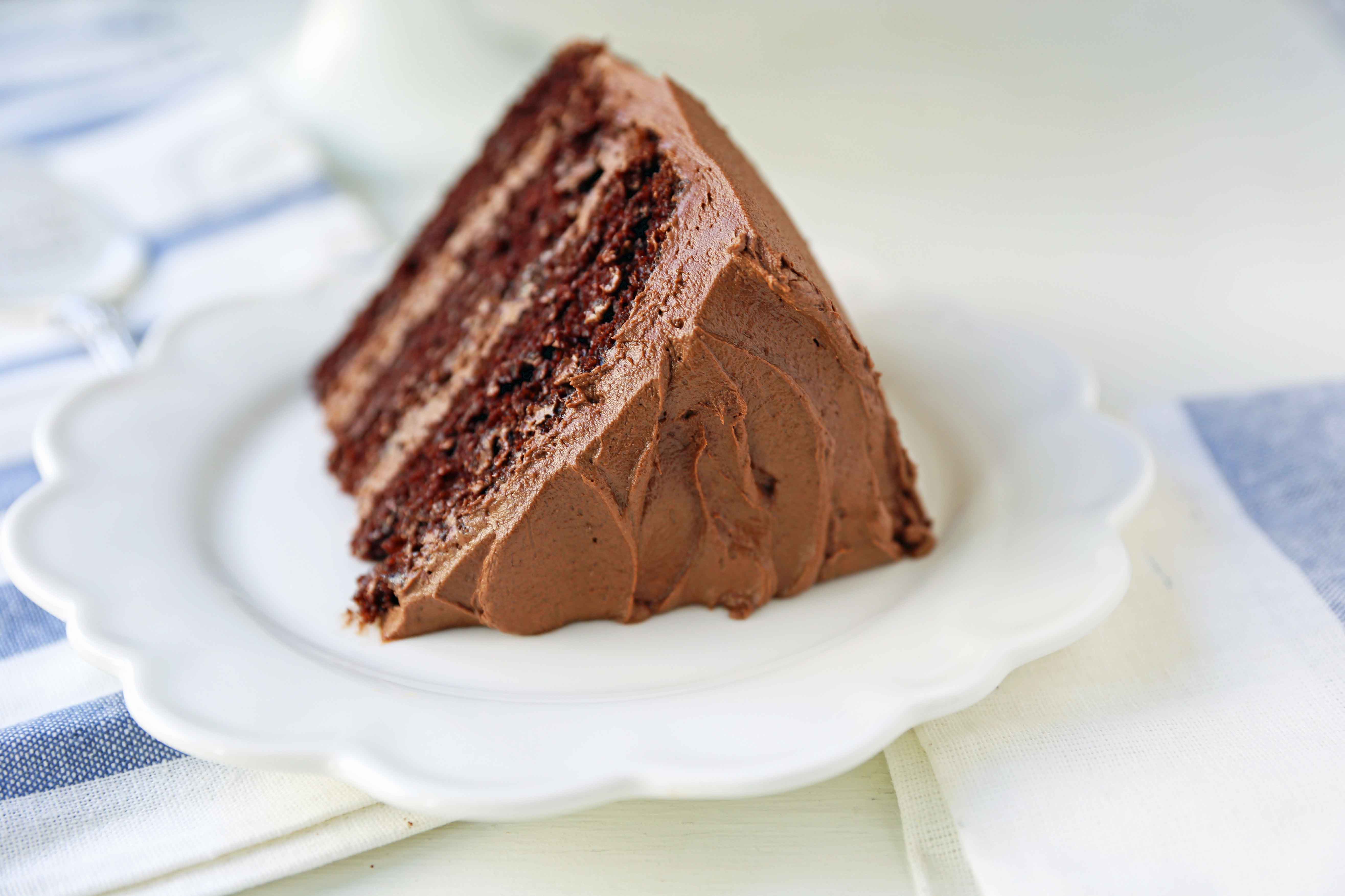 The Best Chocolate Cake Recipe Ever. How to make the perfect chocolate cake with chocolate frosting. 5-star rated chocolate cake recipe. Homemade chocolate cake that comes out perfect every single time. www.modernhoney.com #chocolatecake #cake