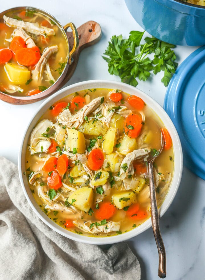 This Homemade Chicken Soup is made with tender chicken, carrots, onion, potatoes, fresh herbs, and seasonings all in a warm chicken broth. This is the perfect chicken soup on a cold winter's day. 