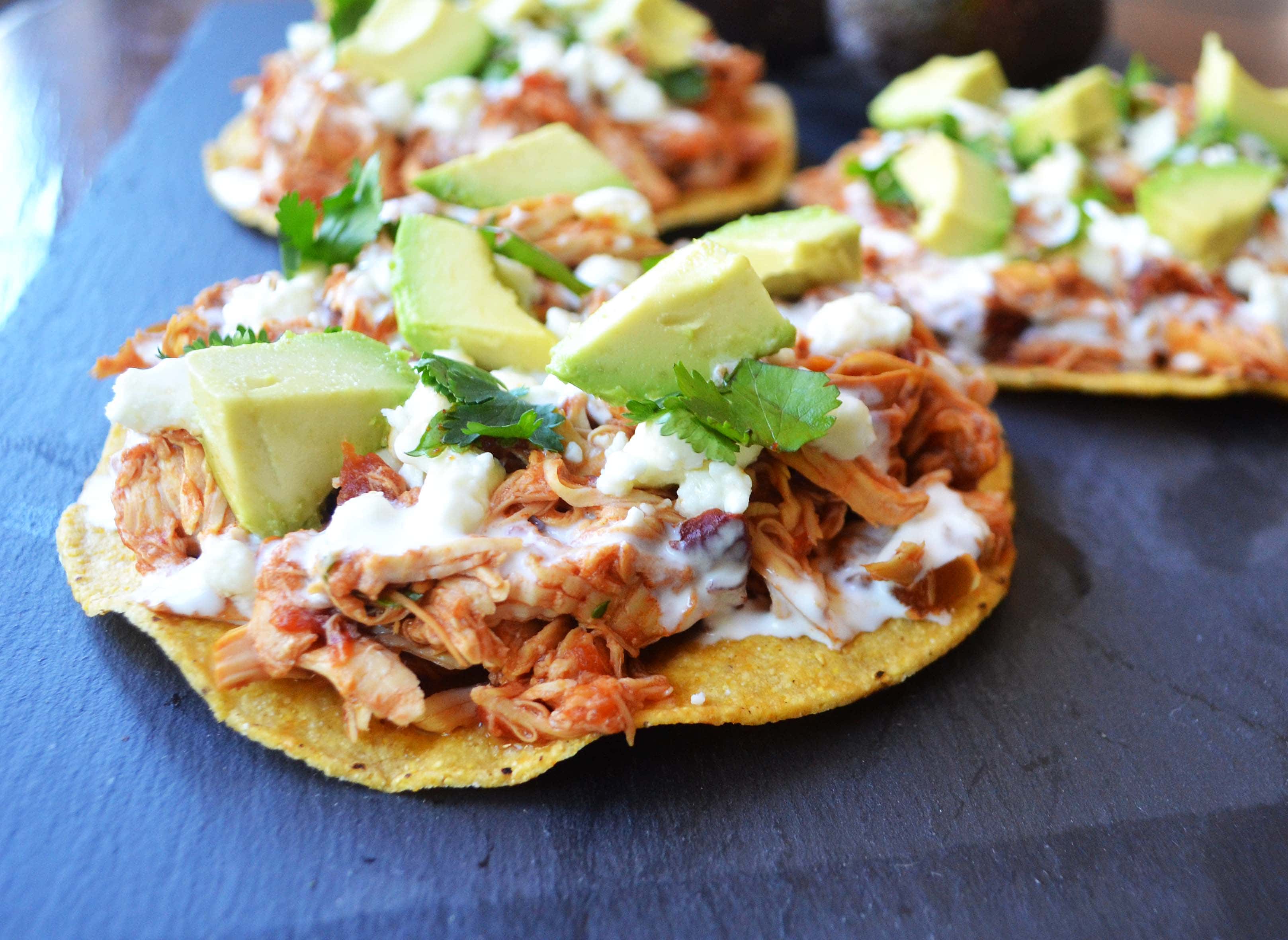 Slow Cooker Chicken Tinga Tostadas. 3 Ingredient Salsa chicken is the easiest dinner recipe and it tastes so good by Modern Honey - www.modernhoney.com