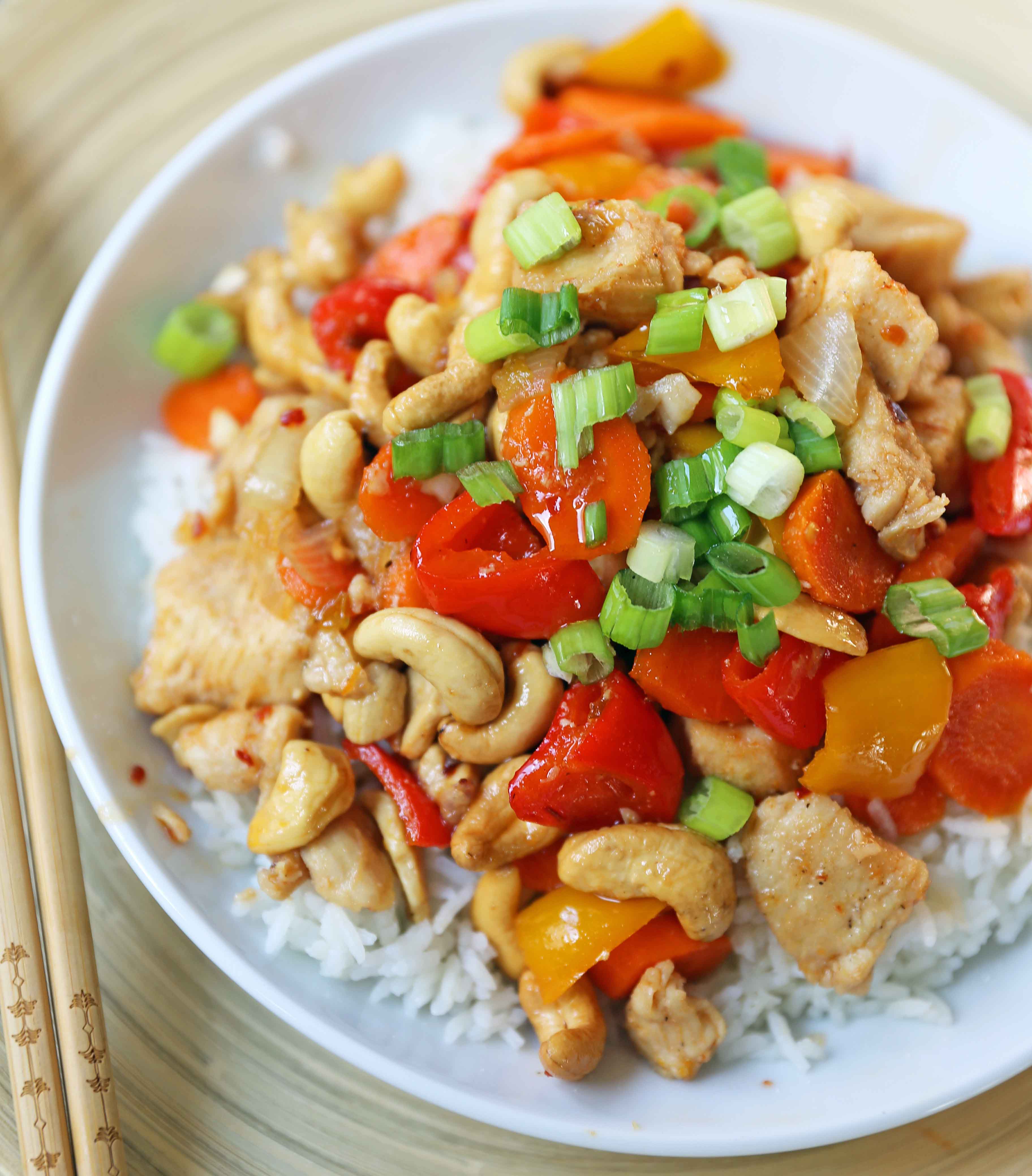 Honey Cashew Chicken. A healthier version of a popular Asian dish -- Cashew Chicken.  Gluten-Free. Dairy-Free. Sugar-Free.  A spicy and sweet chicken with crisp vegetables in a flavorful sauce.  www.modernhoney.com #honeycashewchicken #cashewchicken #chinesechicken #asianfood 