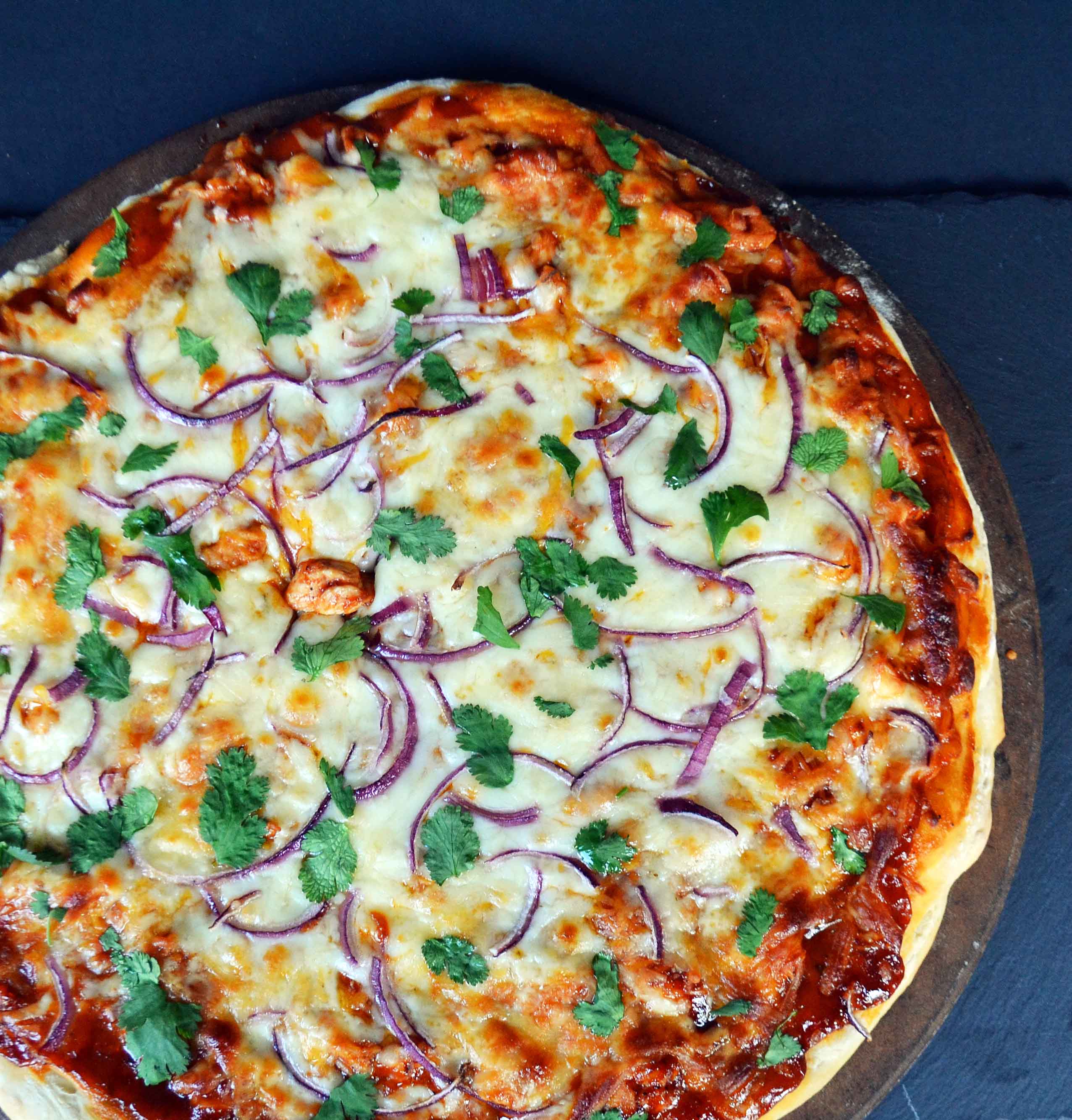 Homemade BBQ Chicken Pizza with a secret ingredient - by Modern Honey www.modernhoney.com