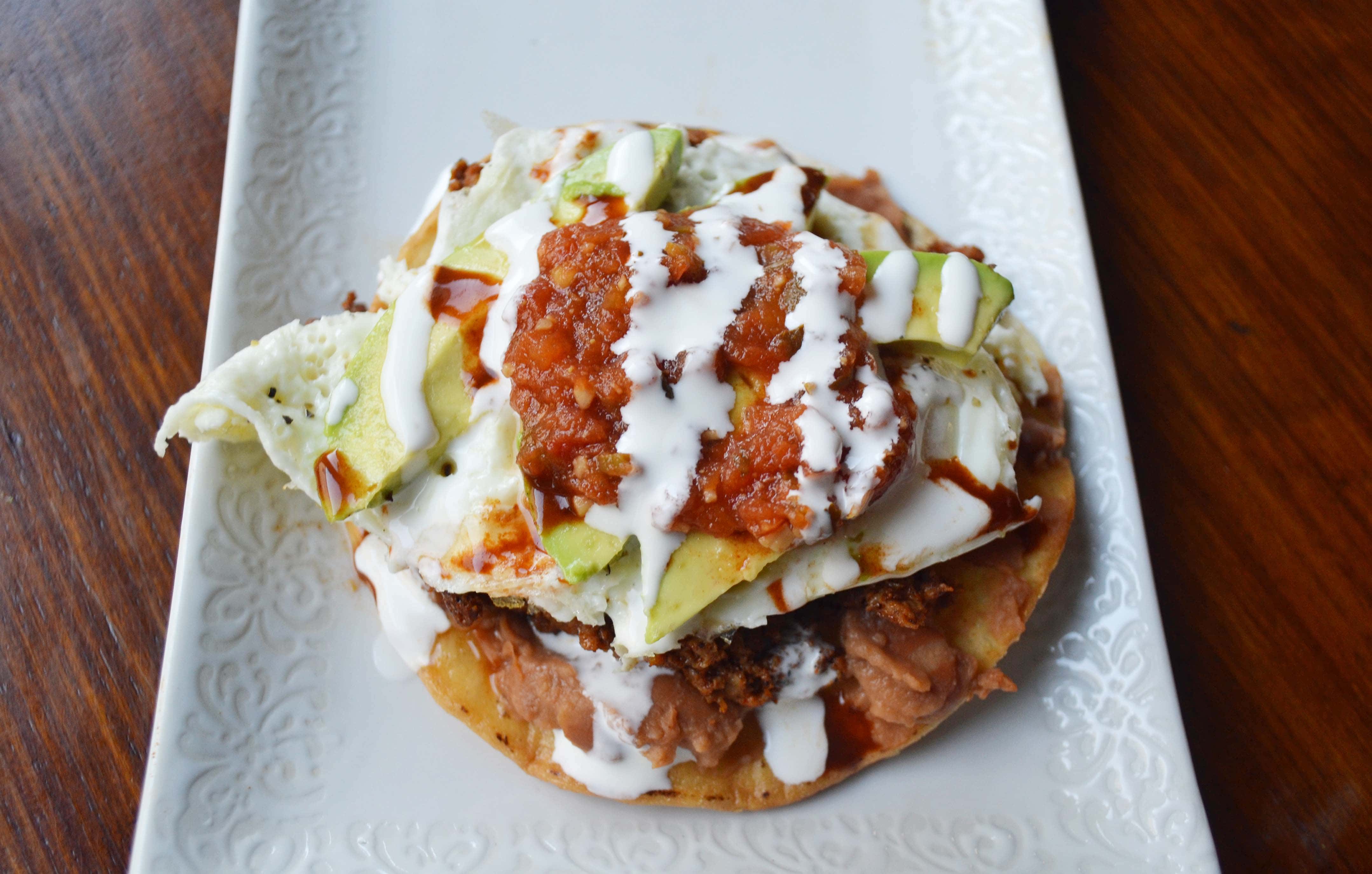 Chorizo Huevos Rancheros Tostadas by Modern Honey - www.modernhoney.com