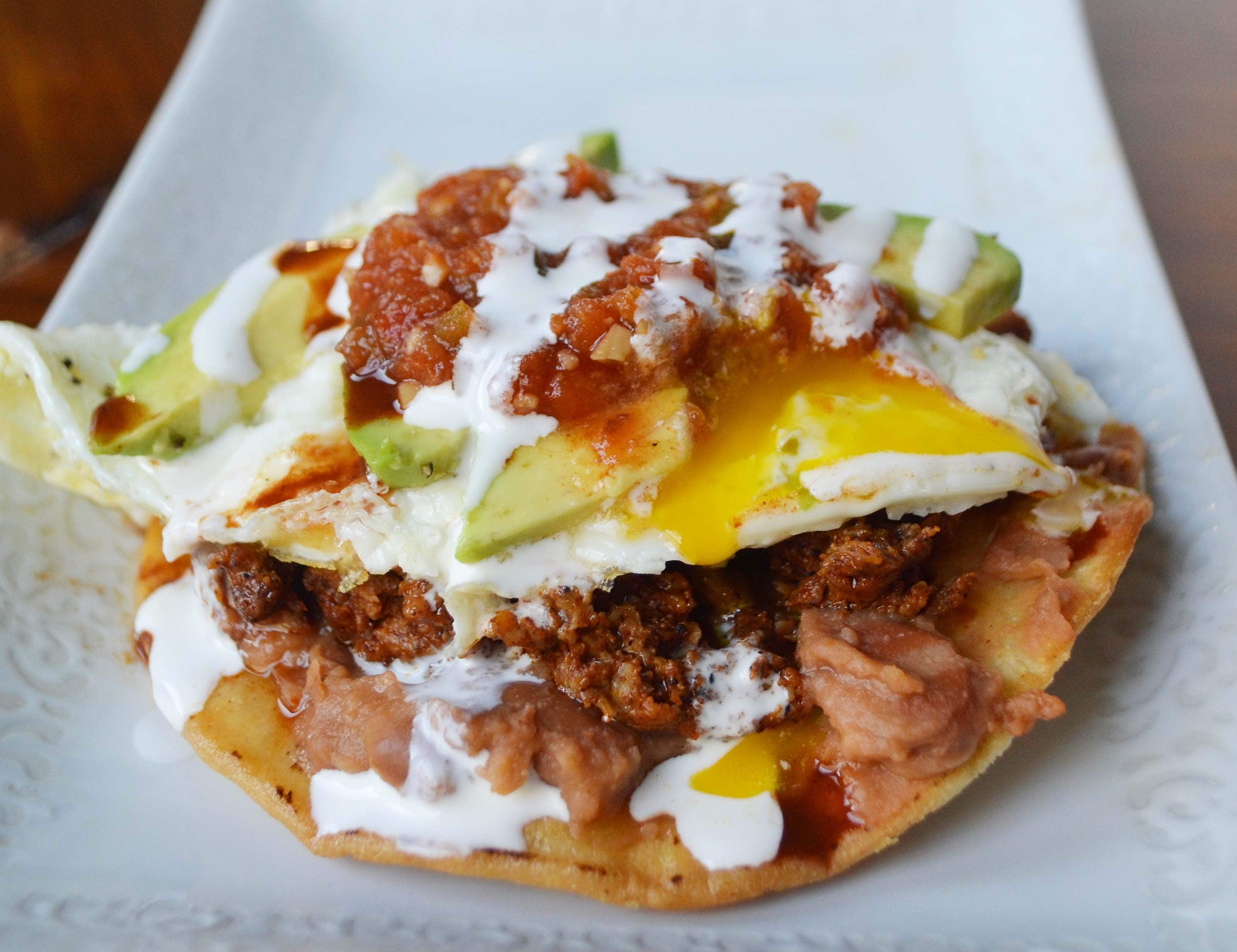 Chorizo Huevos Rancheros Tostadas by Modern Honey - www.modernhoney.com