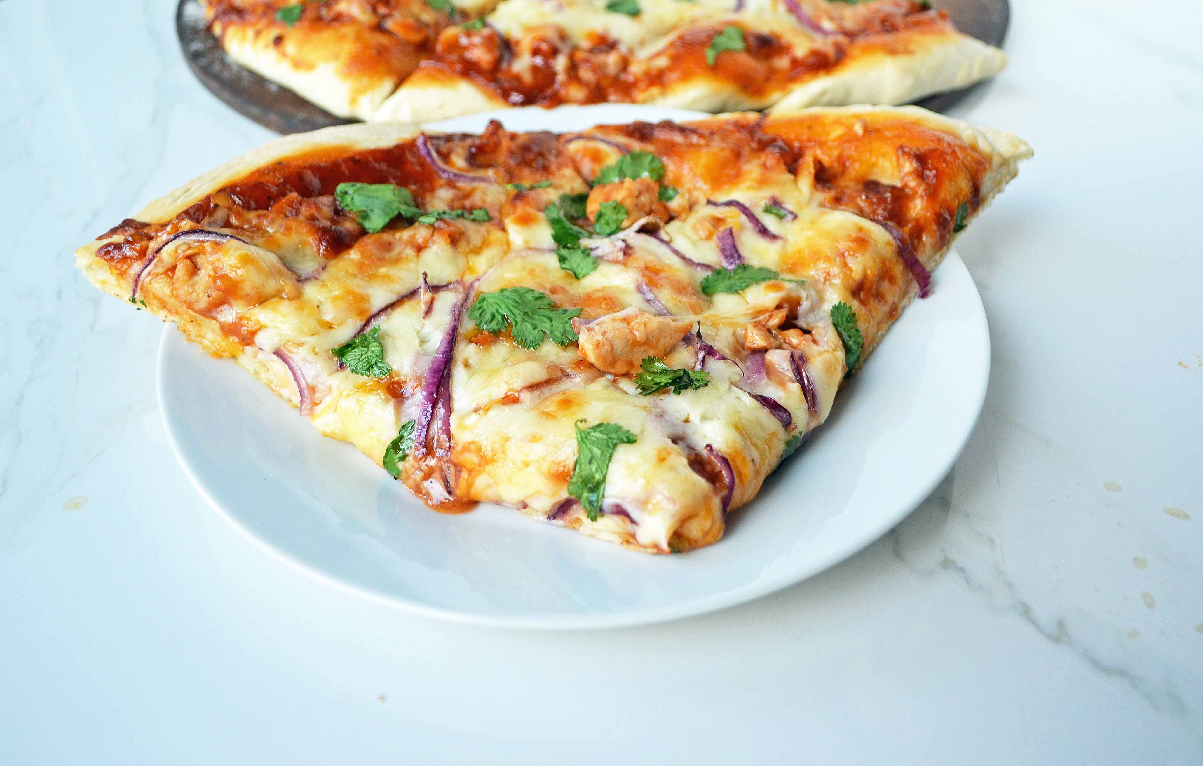 Homemade BBQ Chicken Pizza with easy homemade pizza crust and a secret ingredient in the sauce. Modern Honey I www.modernhoney.com