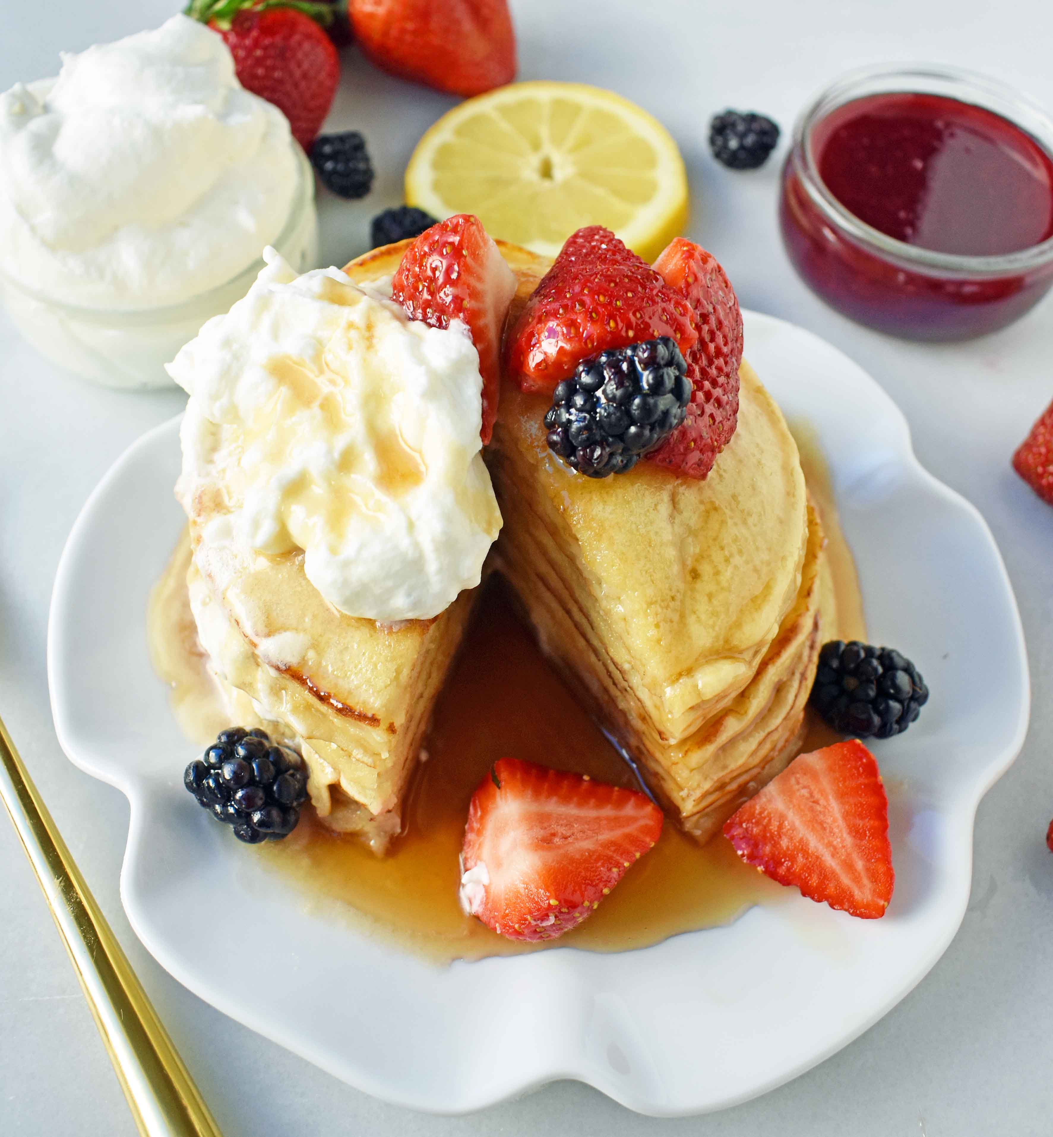 Sweet Cream Ricotta Pancakes are the perfect combination of a silky, creamy crepe and a fluffy buttermilk pancake. A family breakfast favorite! www.modernhoney.com