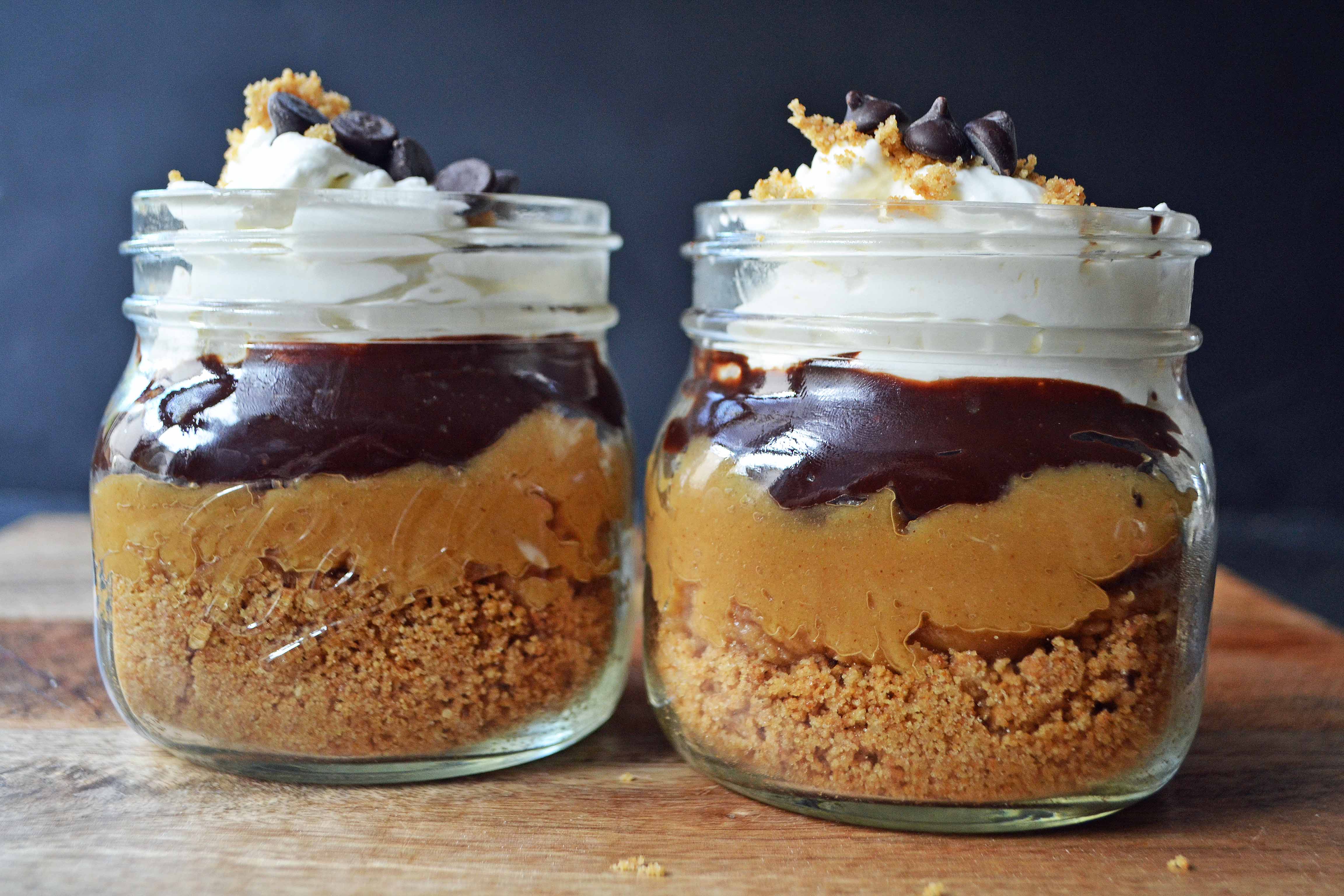 The Eligible Bachelor Peanut Butter Pie Jars by Modern Honey l Graham Cracker Crust, Peanut Butter Cream, Chocolate Ganache, and Homemade Whipped Cream