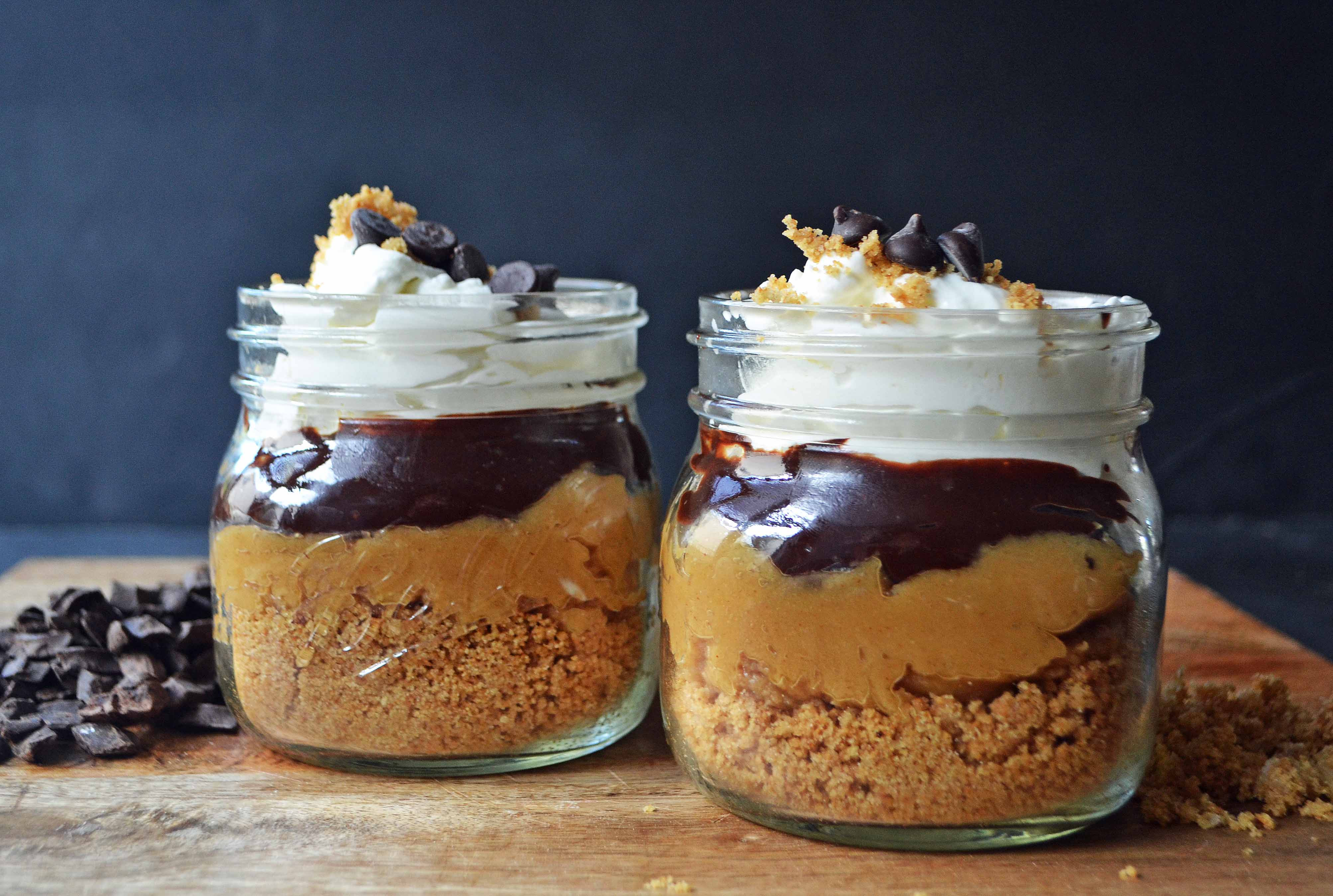 The Eligible Bachelor Peanut Butter Pie Jars by Modern Honey l Graham Cracker Crust, Peanut Butter Cream, Chocolate Ganache, and Homemade Whipped Cream