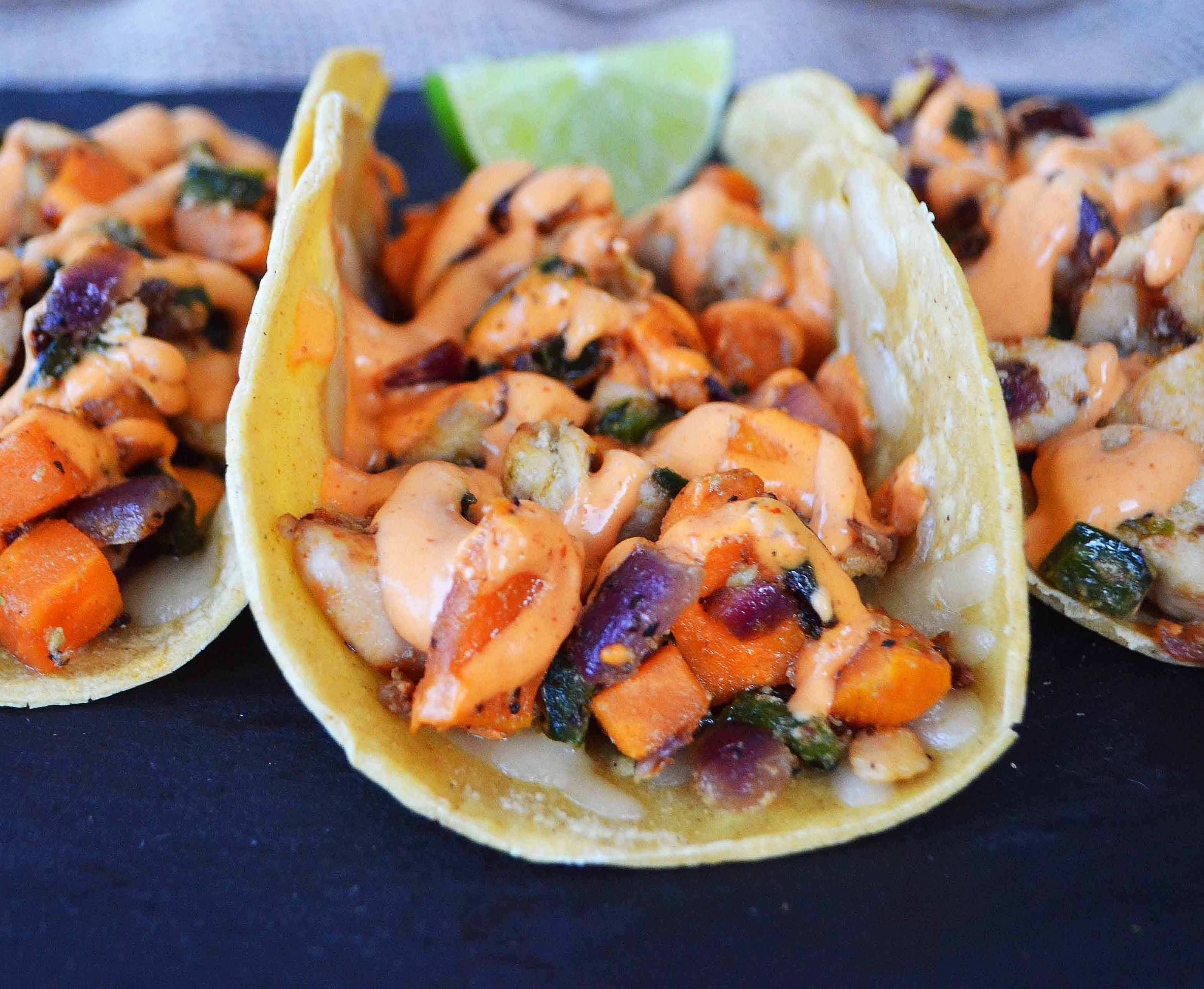 Chicken Poblano Sweet Potato Tacos with Chipotle Cream. Flavorful and slightly spicy chicken and veggies tacos on corn tortillas. www.modernhoney.com #mexicanfood #mexican #tacos #taco 