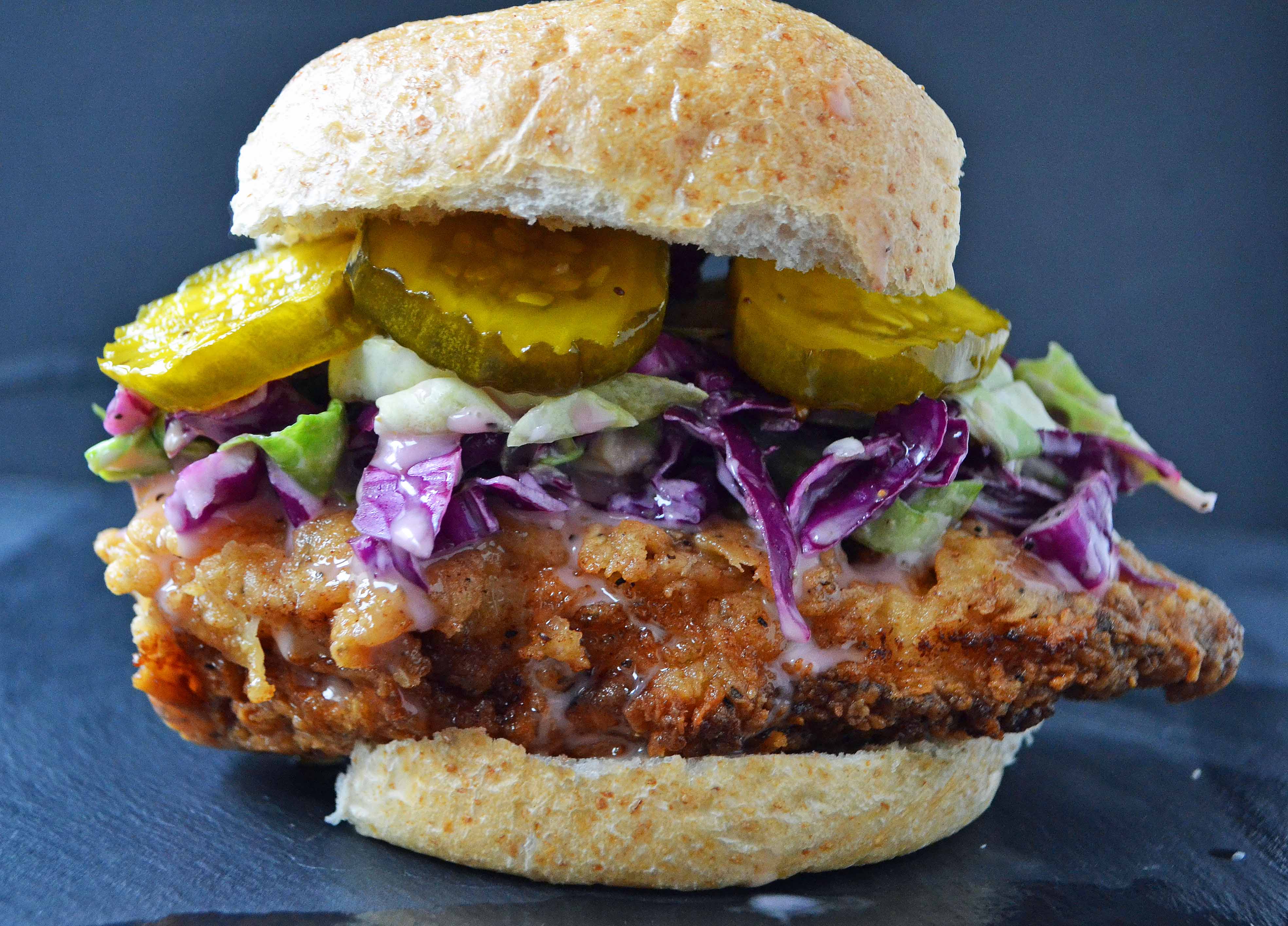 Bubby's Buttermilk Fried Chicken Sandwich with Creamy Coleslaw and Spicy Pickles by Modern Honey l www.modernhoney.com