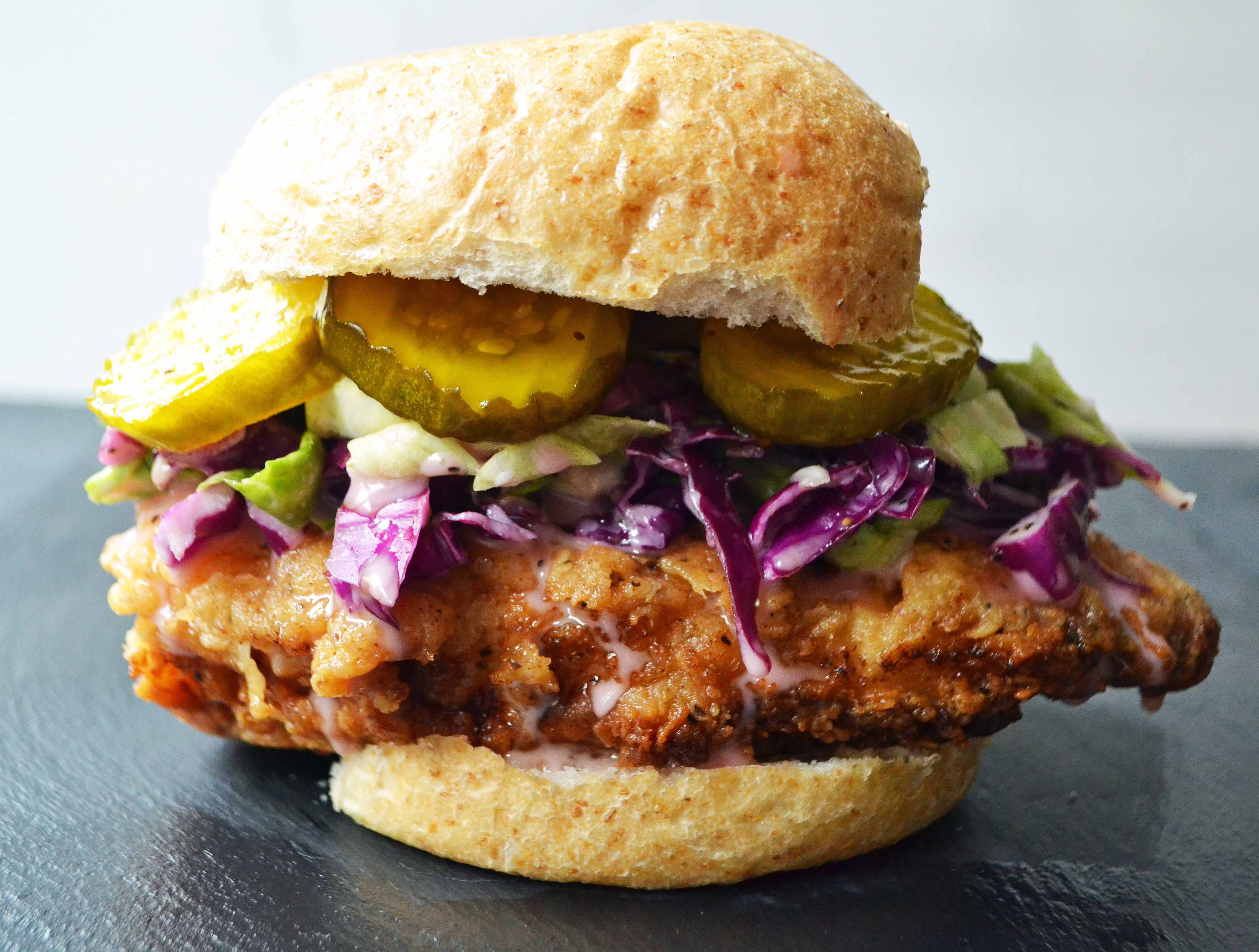 Bubby's Buttermilk Fried Chicken Sandwich with Creamy Coleslaw and Spicy Pickles by Modern Honey l www.modernhoney.com