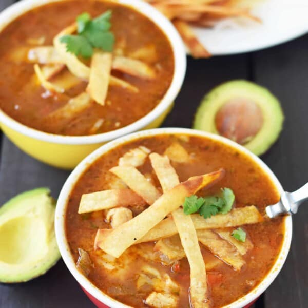 Homemade Chicken Tortilla Soup. The BEST Chicken Tortilla Soup made with tender chicken, Mexican spices, and homemade tortilla strips. www.modernhoney.com