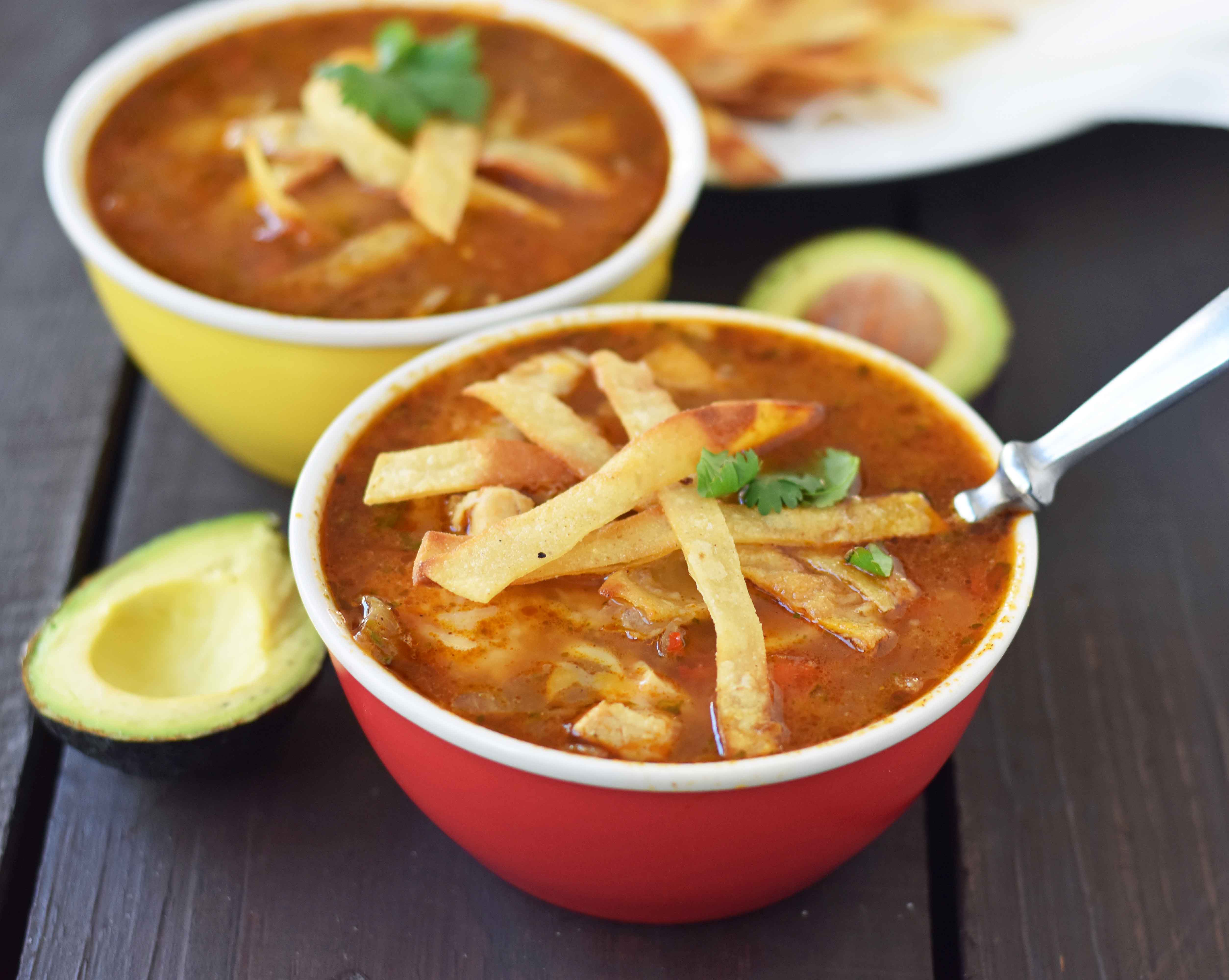 Homemade Chicken Tortilla Soup. The BEST Chicken Tortilla Soup made with tender chicken, Mexican spices, and homemade tortilla strips. www.modernhoney.com