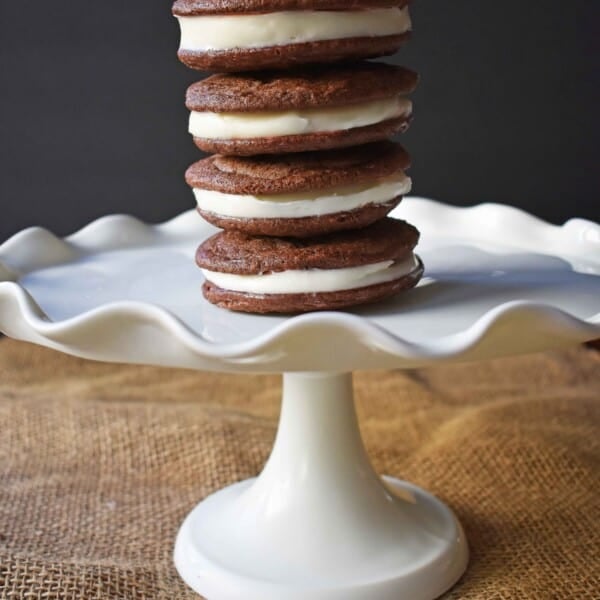 Homemade Oreo Cookies by Modern Honey. Rich Chocolate Cookies filled with Sweet Buttercream Filling. It's Oreos cookies but so much better.