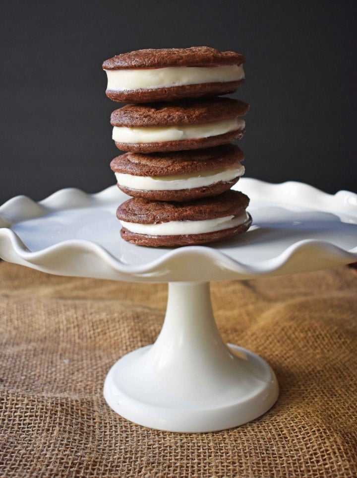 Homemade Oreo Cookies by Modern Honey. Rich Chocolate Cookies filled with Sweet Buttercream Filling. It's Oreos cookies but so much better.