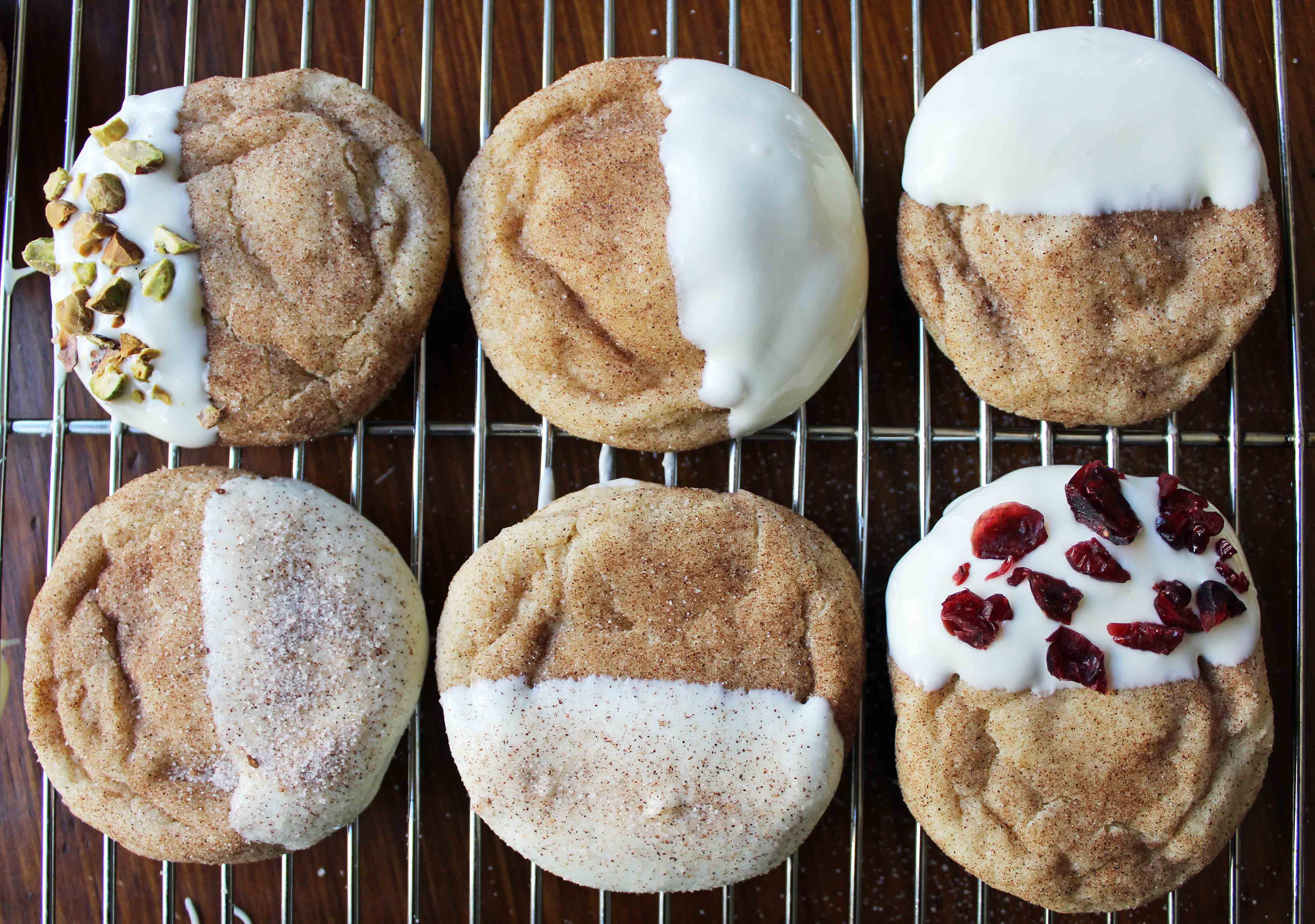 White Chocolate Dipper Snickerdoodles. The only Snickerdoodle Cookie recipe you will ever need. Perfect cinnamon sugar Snickerdoodles every single time. Snickerdoodles dipped in white chocolate make them even better. www.modernhoney.com