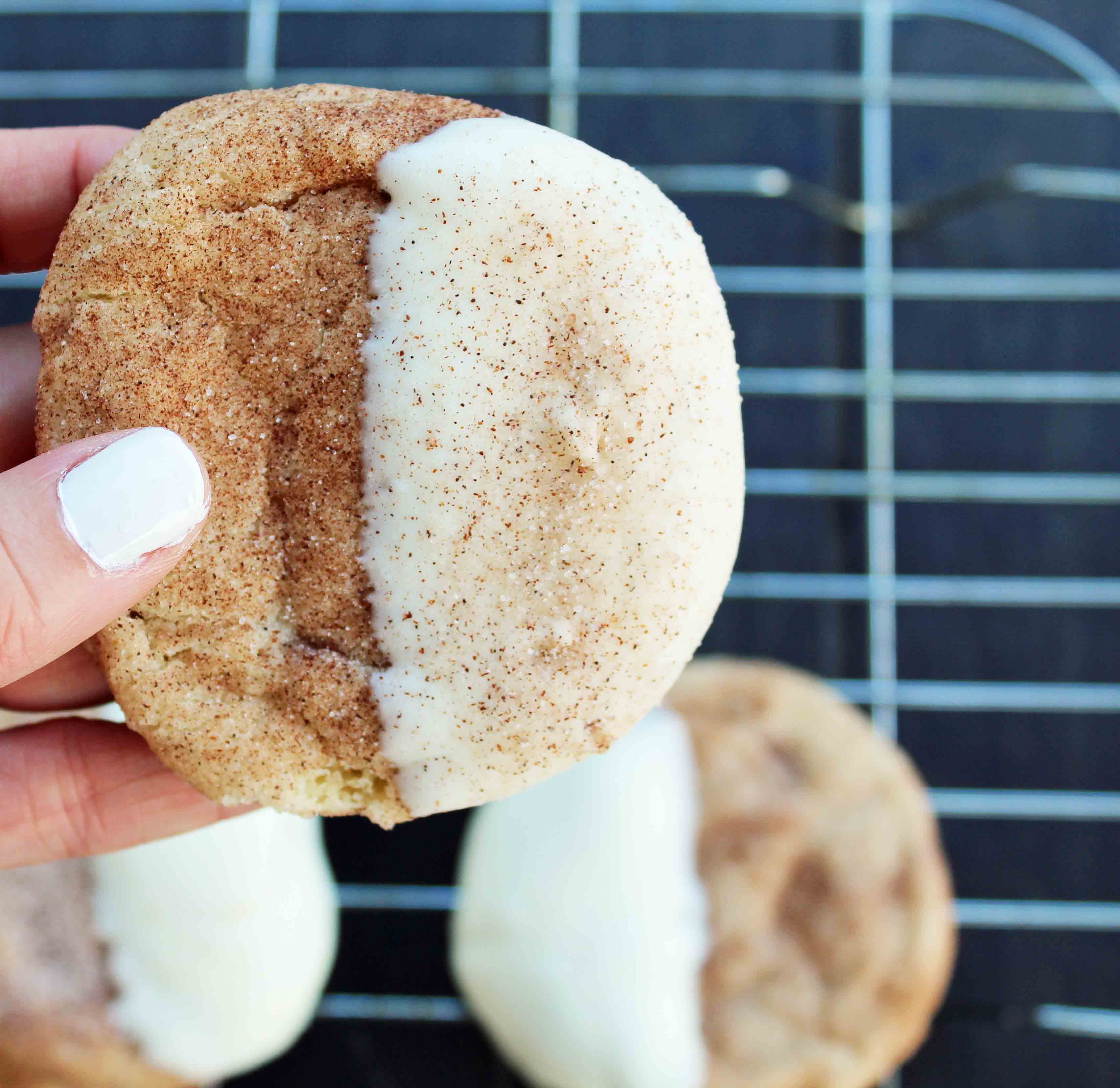 White Chocolate Dipper Snickerdoodles. The only Snickerdoodle Cookie recipe you will ever need. Perfect cinnamon sugar Snickerdoodles every single time. Snickerdoodles dipped in white chocolate make them even better. www.modernhoney.com