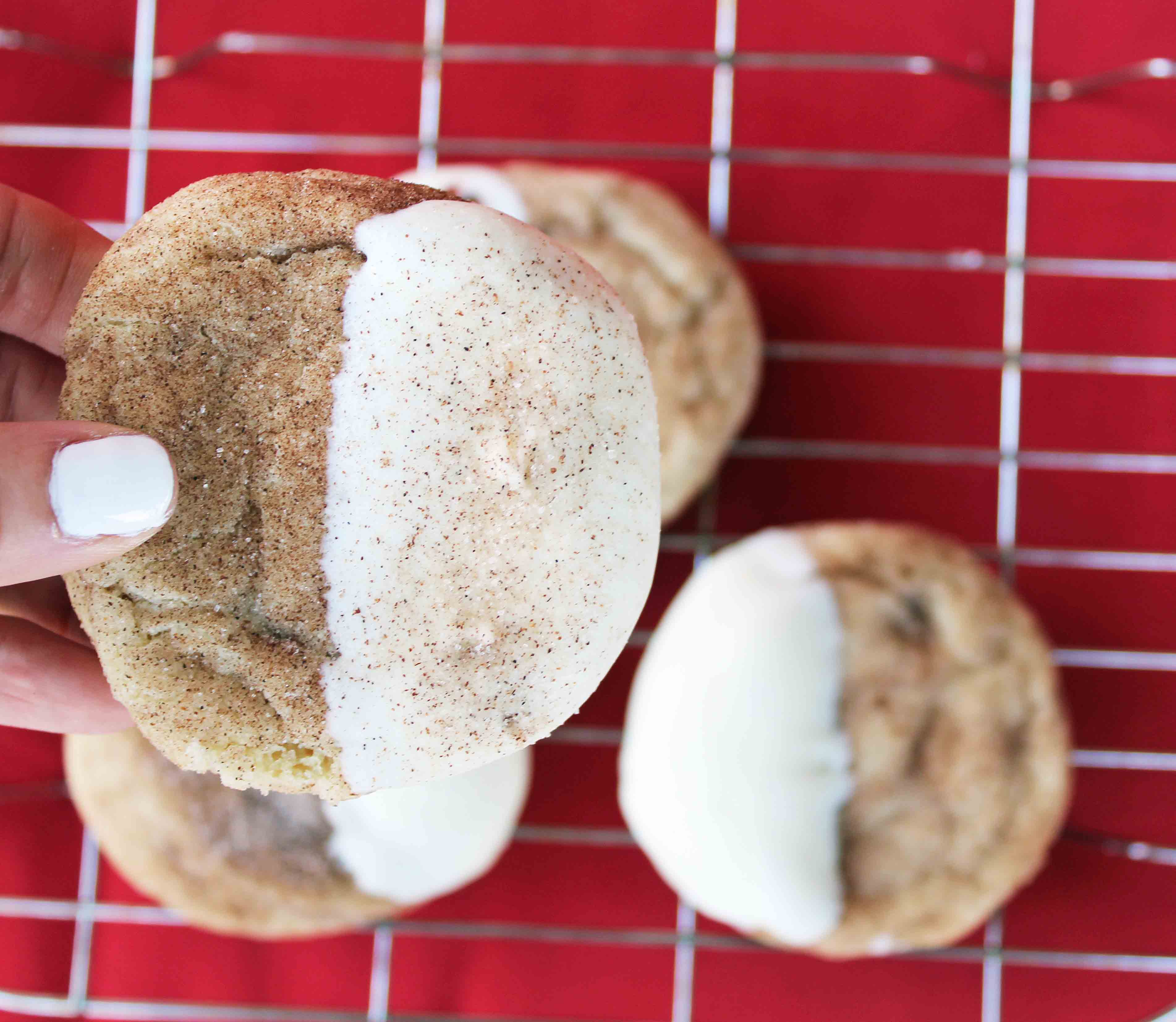 White Chocolate Dipper Snickerdoodles. The only Snickerdoodle Cookie recipe you will ever need. Perfect cinnamon sugar Snickerdoodles every single time. Snickerdoodles dipped in white chocolate make them even better. www.modernhoney.com