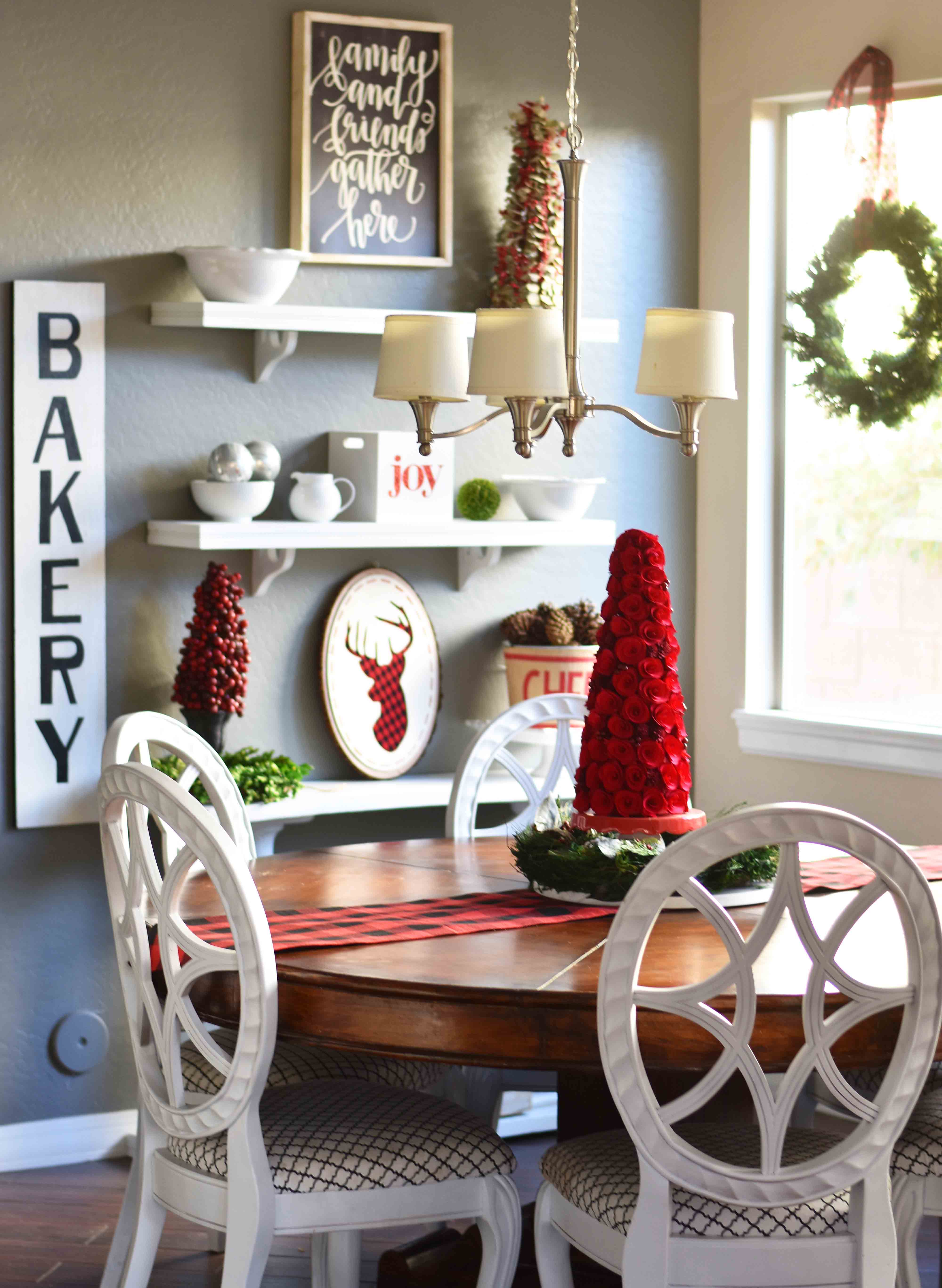 Christmas Decor Ideas. Farmhouse Christmas decorating ideas. Buffalo Plaid Christmas, Red Christmas Topiary, Natural Green Wreaths. A Magnoila House Christmas. www.modernhoney.com