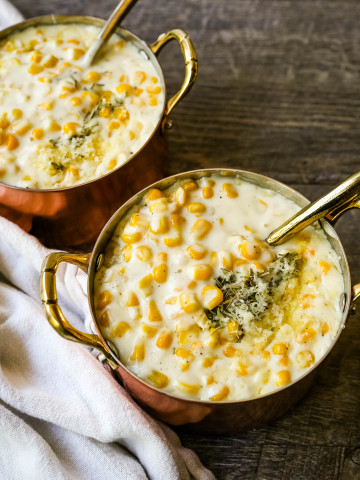 How to make the best creamed corn. A creamy corn recipe made with heavy cream, butter, corn, parmesan cheese, a touch of sugar and salt. A popular side dish or Thanksgiving side dish recipe. www.modernhoney.com #corn #creamedcorn #gullliverscorn #sidedish #thanksgiving