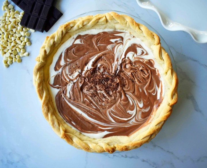 Chocolate Marshmallow Marble Pie. Chocolate Marshmallow Cream swirled together with White Chocolate Marshmallow Cream for a rich, decadent, popular pie.