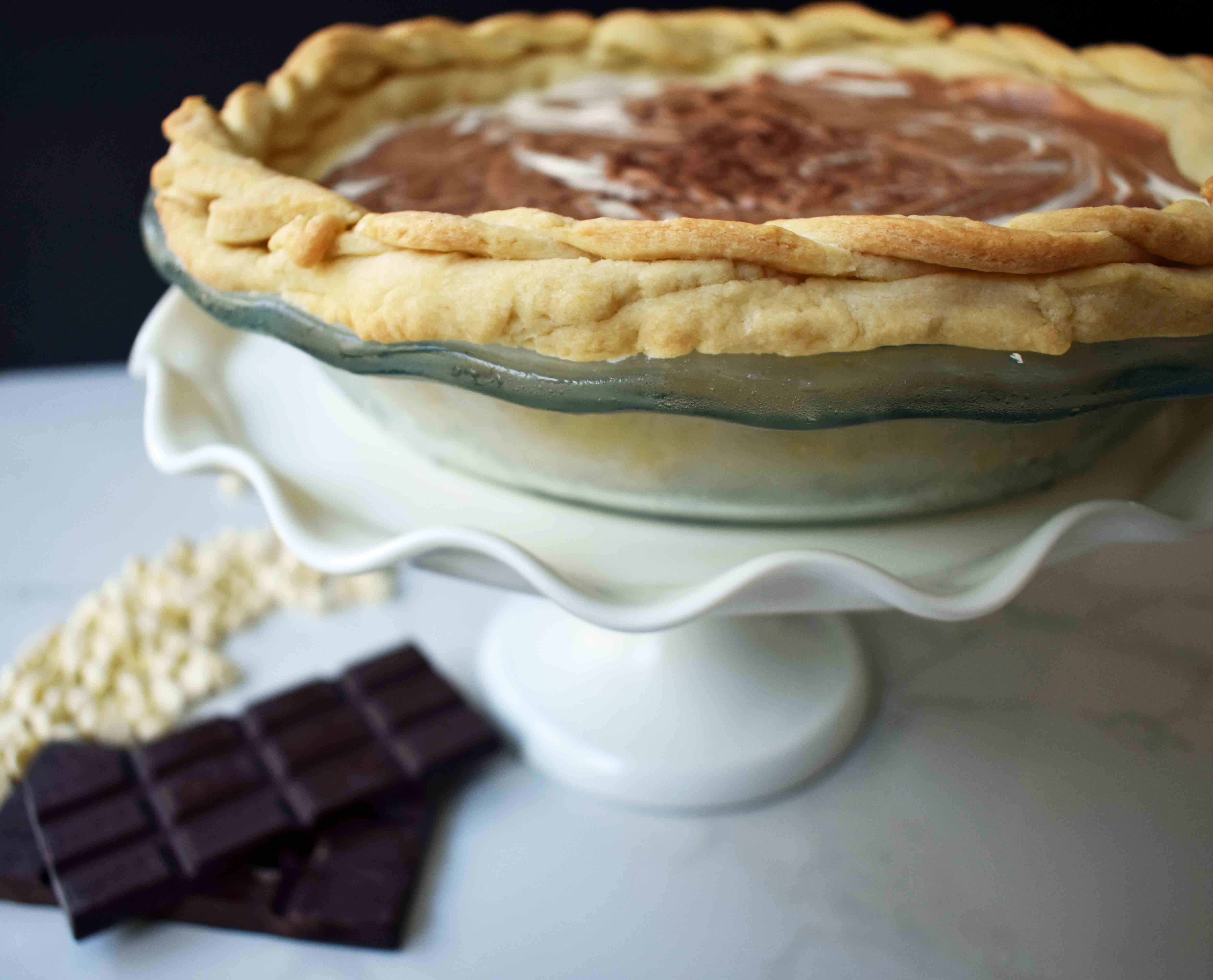 Chocolate Marshmallow Marble Pie. Chocolate Marshmallow Cream swirled together with White Chocolate Marshmallow Cream for a rich, decadent, popular pie.