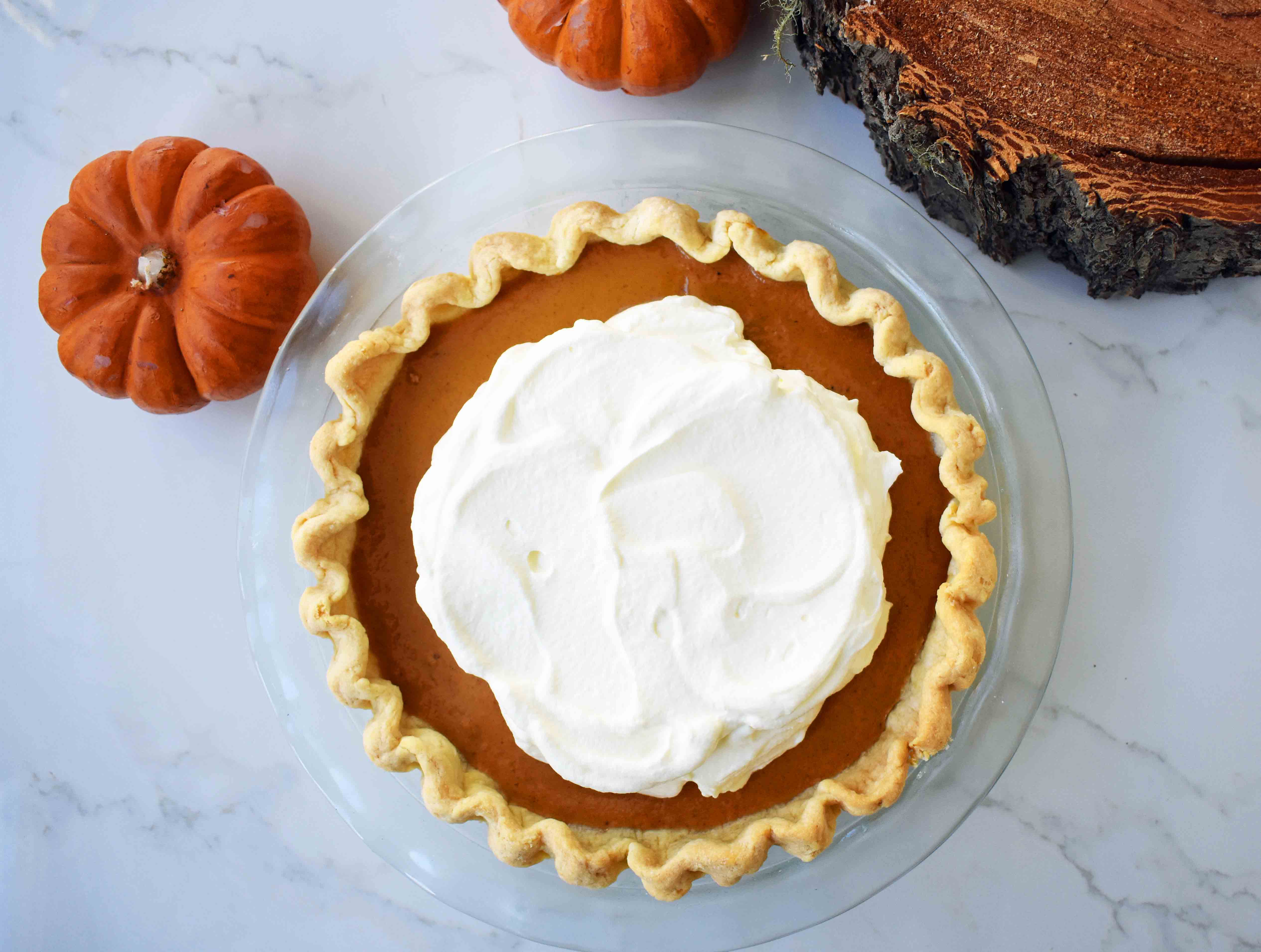 Perfect Pumpkin Pie by Modern Honey. Pumpkin Pie filling made with sweetened condensed milk, eggs, and spices. Creamy Pumpkin Pie every time!