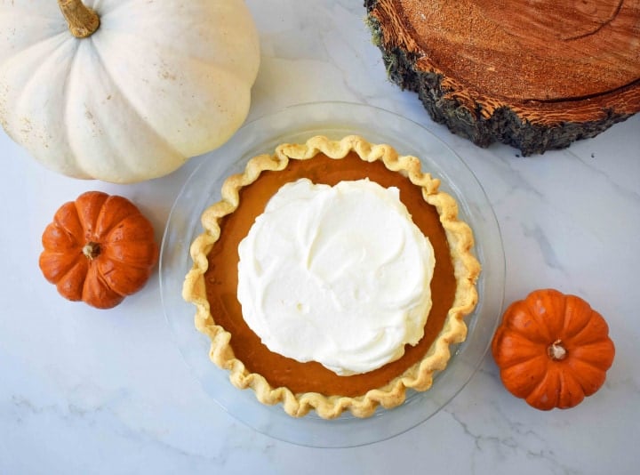Perfect Pumpkin Pie by Modern Honey. Pumpkin Pie filling made with sweetened condensed milk, eggs, and spices. Creamy Pumpkin Pie every time!