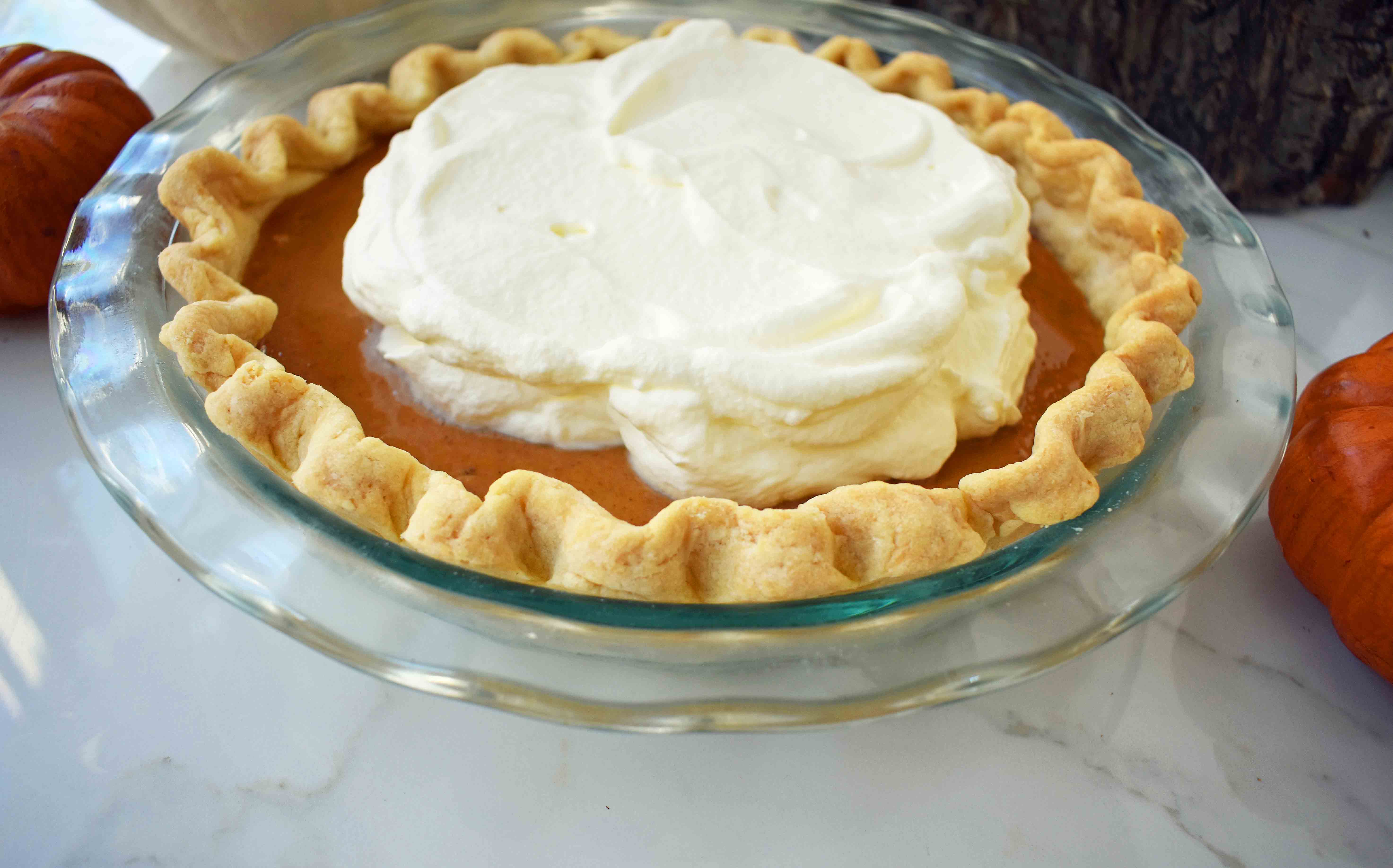 Perfect Pumpkin Pie by Modern Honey. Pumpkin Pie filling made with sweetened condensed milk, eggs, and spices. Creamy Pumpkin Pie every time!