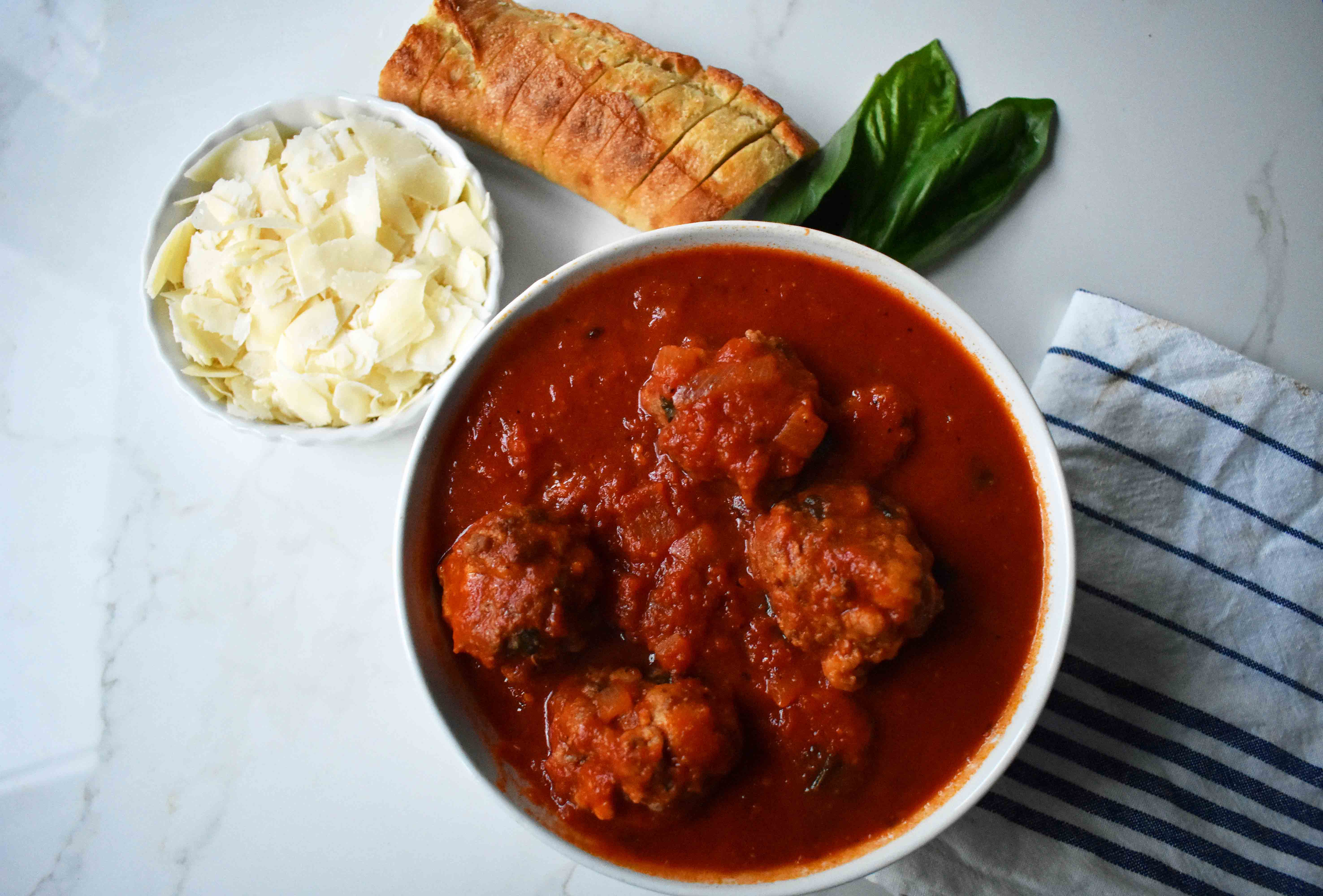 Mama's Best Ever Spaghetti and Meatballs by Modern Honey. Homemade meatballs made from scratch. Authentic Italian meatballs and marinara sauce.