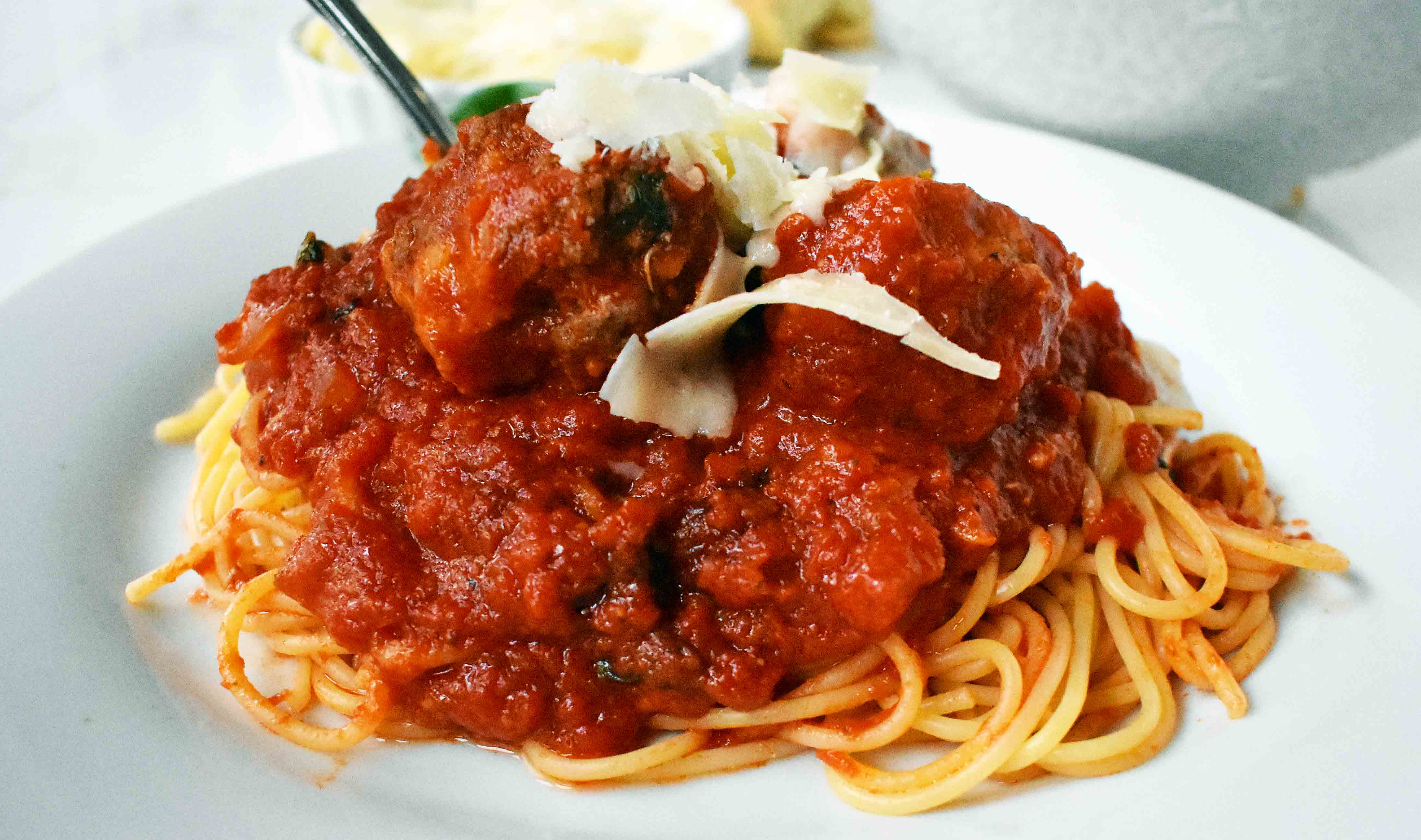 Mama's Best Ever Spaghetti and Meatballs by Modern Honey. Homemade meatballs made from scratch. Authentic Italian meatballs and marinara sauce.