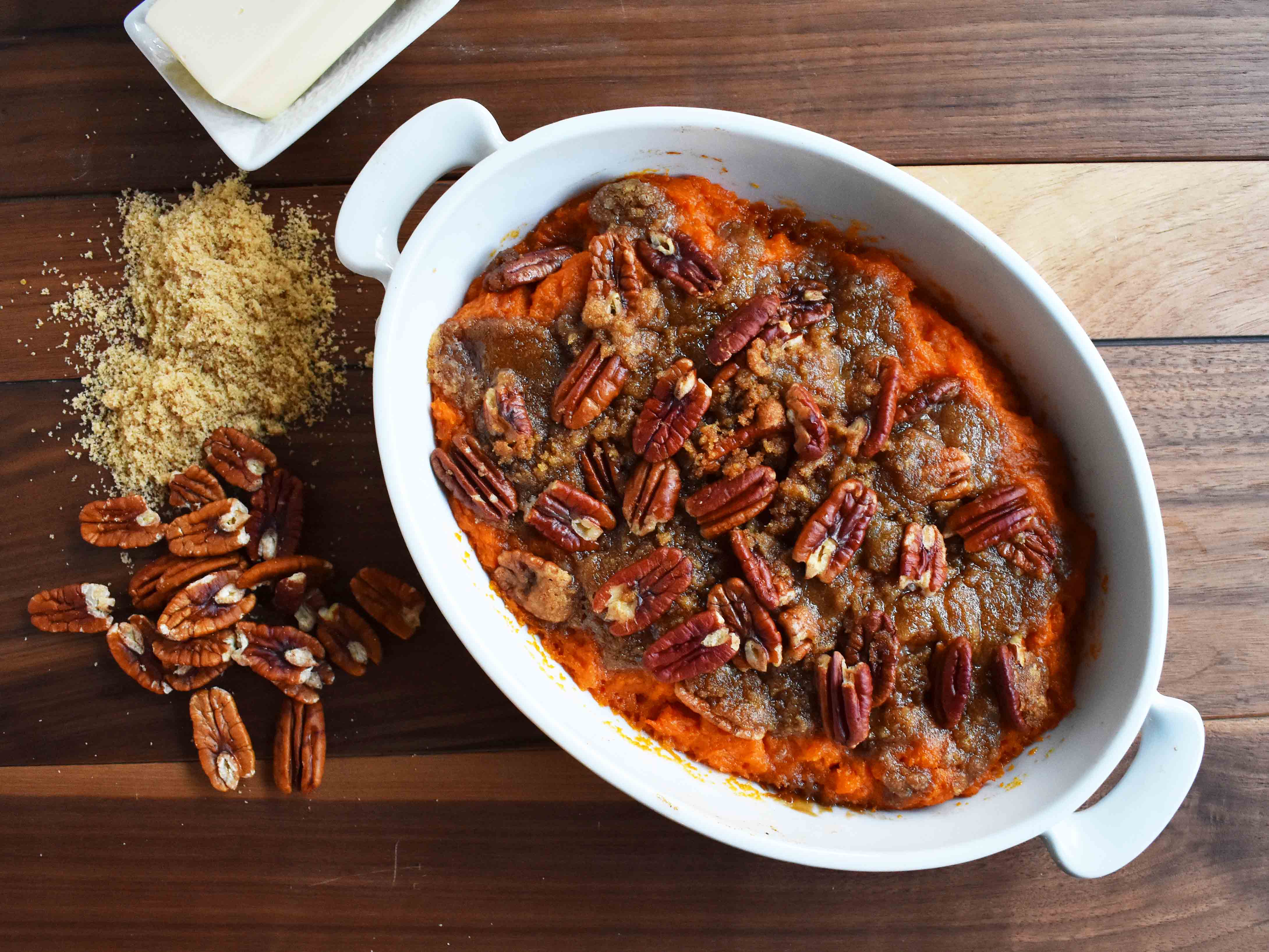 Sweet Potato Brown Sugar Pecan Bake by Modern Honey. Vanilla Cinnamon Sweet Potato sprinkled with Brown Sugar Pecan Topping. It's the perfect side dish.