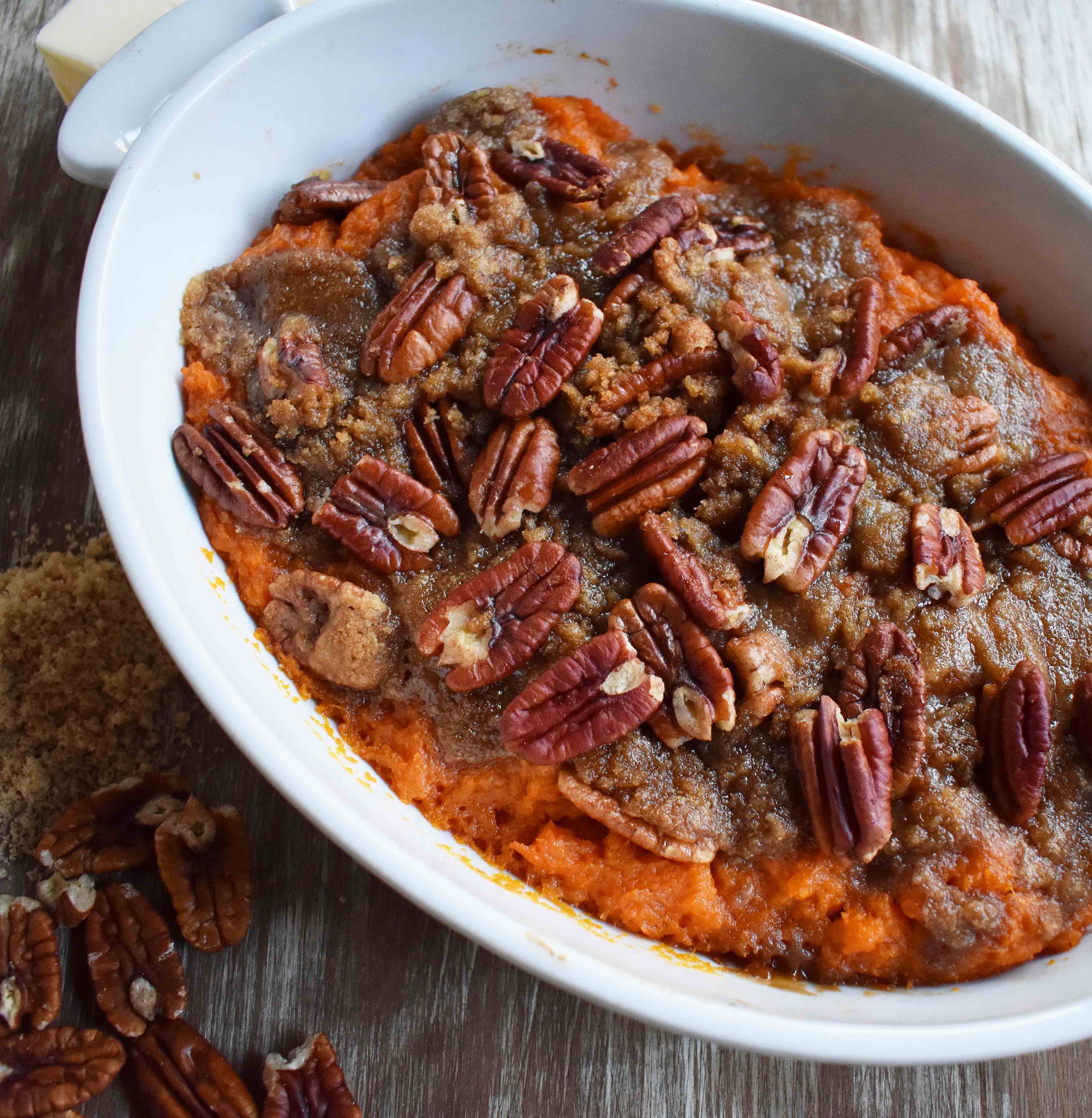 Sweet Potato Brown Sugar Pecan Bake by Modern Honey. Vanilla Cinnamon Sweet Potato sprinkled with Brown Sugar Pecan Topping. It's the perfect side dish.