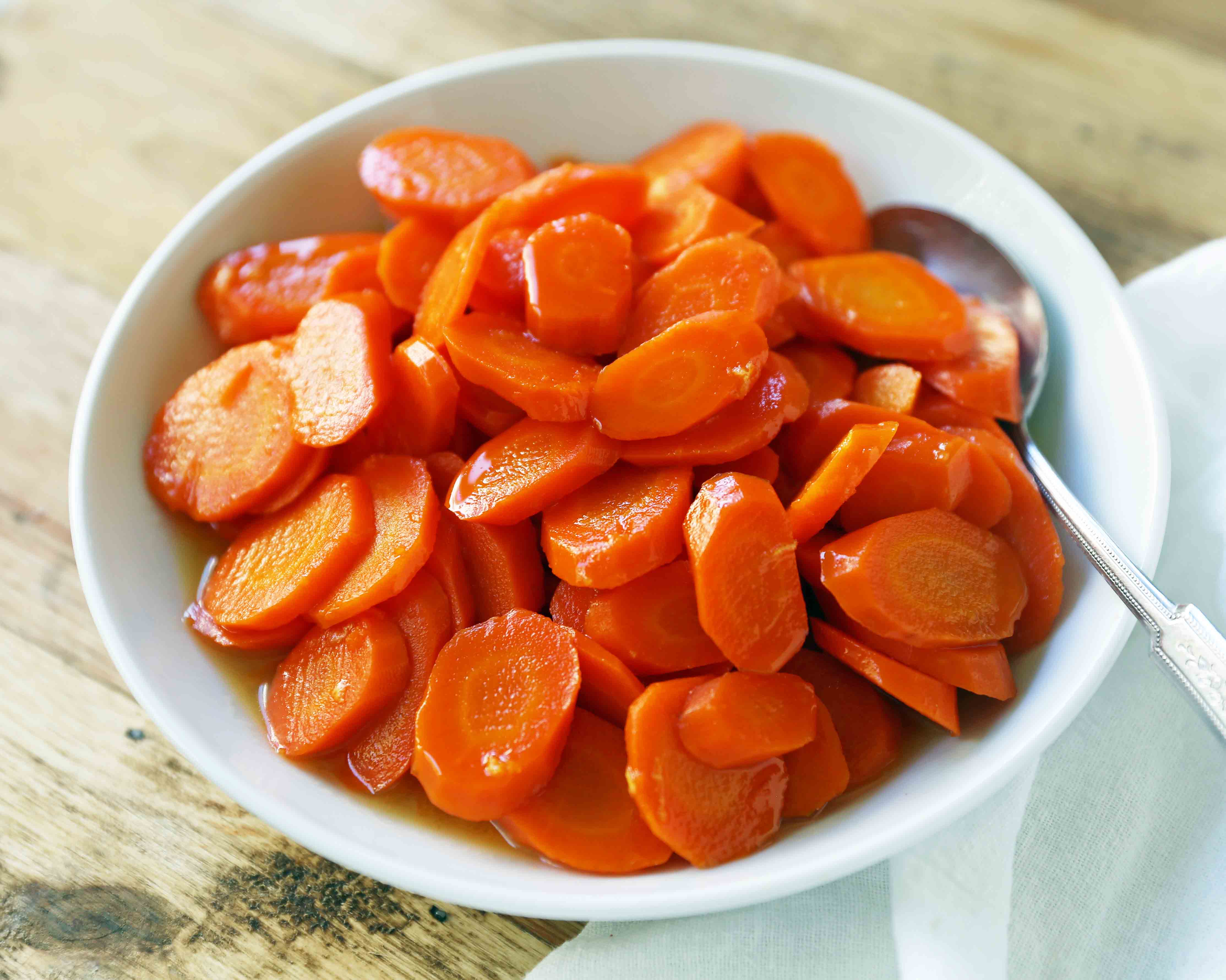 Honey Butter Glazed Carrots. Carrots, honey, butter, and lemon zest is vibrant Thanksgiving side dish. www.modernhoney.com #carrots #honeycarrots #honeybuttercarrots #cookedcarrots #sidedish #sidedishes 