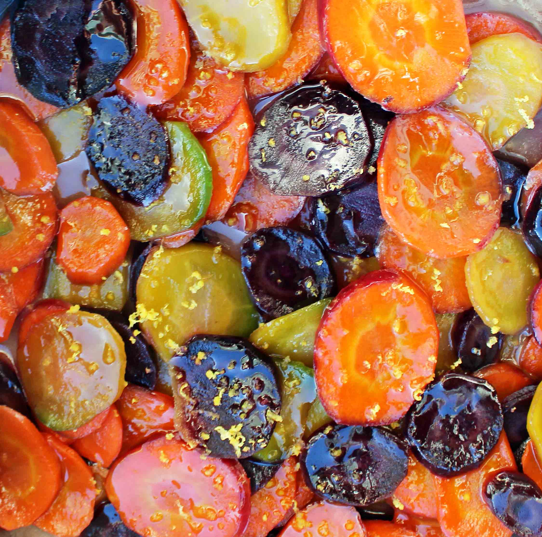 Honey Butter Glazed Carrots by Modern Honey. Heirloom Carrots, Sweet Cream Butter, Creamy Honey, and Lemon Zest make these carrots a real crowd pleaser. A simple but flavorful side dish.