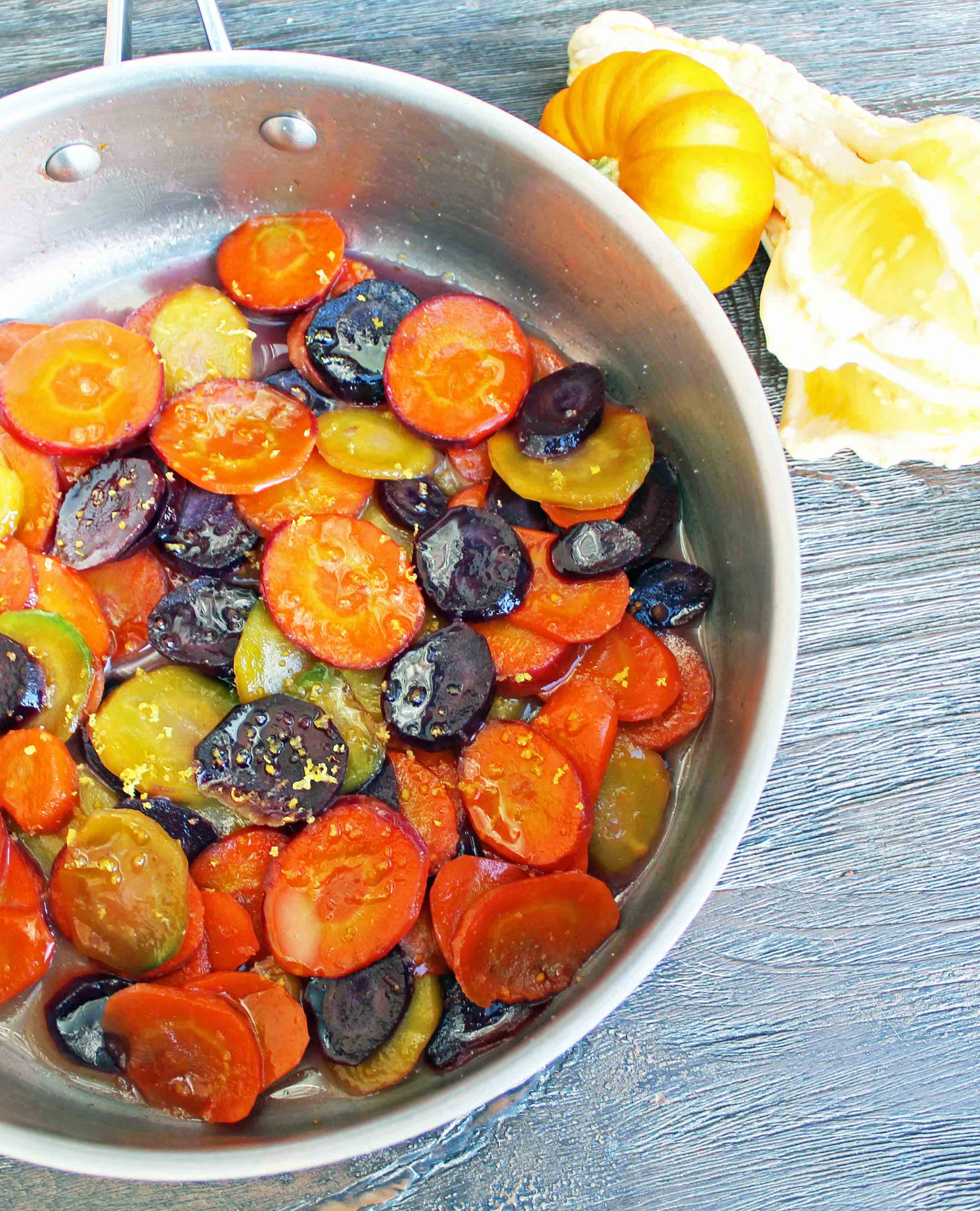 Honey Butter Glazed Carrots by Modern Honey. Heirloom Carrots, Sweet Cream Butter, Creamy Honey, and Lemon Zest make these carrots a real crowd pleaser. A simple but flavorful side dish.