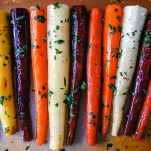 These roasted carrots are  made with butter, honey, salt, and a touch of fresh lemon zest. These are the best honey glazed carrots and a perfect classic side dish.