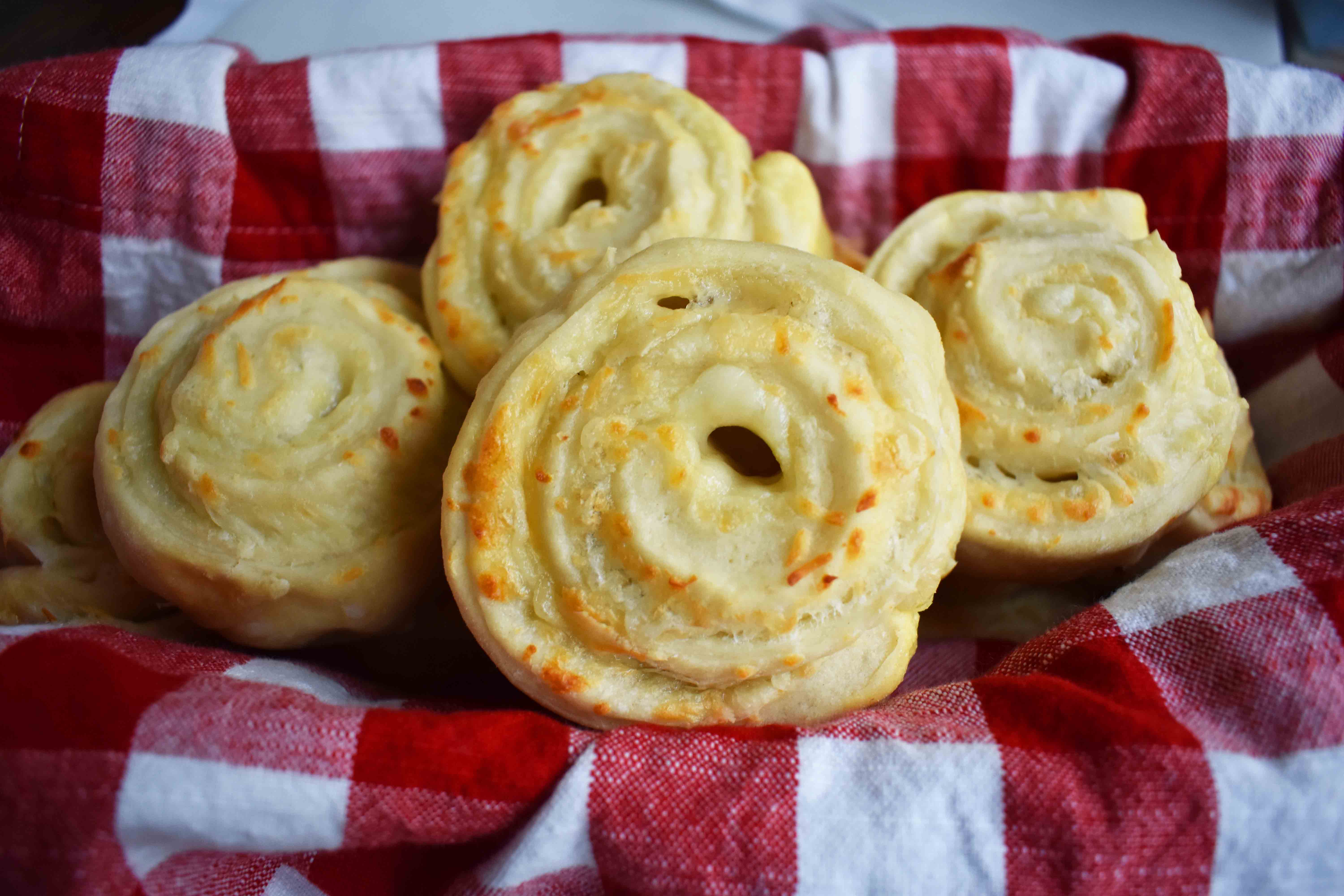 Golden's Garlic Parmesan Cheese Rolls by Modern Honey. Made with 5 simple ingredients -- pizza dough, butter, garlic powder, parmesan and mozzarella cheese. 