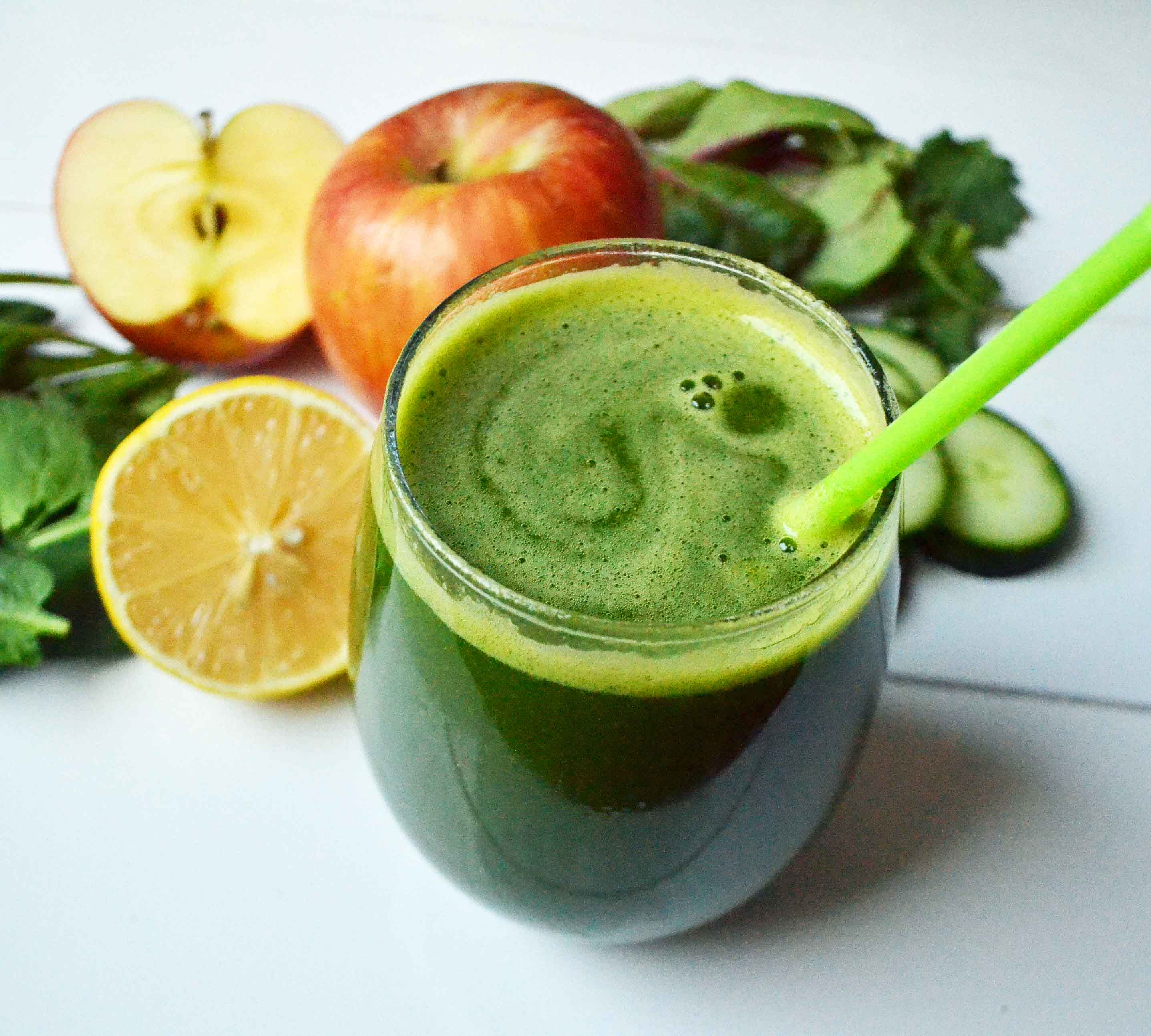 Youthful Glow Green Smoothie by Modern Honey. Healthy green smoothie made with whole foods -- spinach, apple, lemon, kale, cucumber, and banana.