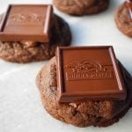 Ghirardelli Squares Chocolate Cookies. Double Chocolate Cookies topped with a creamy Ghirardelli square chocolate. Milk Chocolate Caramel, Dark Chocolate Mint,or Peppermint Bark Ghirardelli Squares are placed on top of this decadent cookie. A crowd favorite!