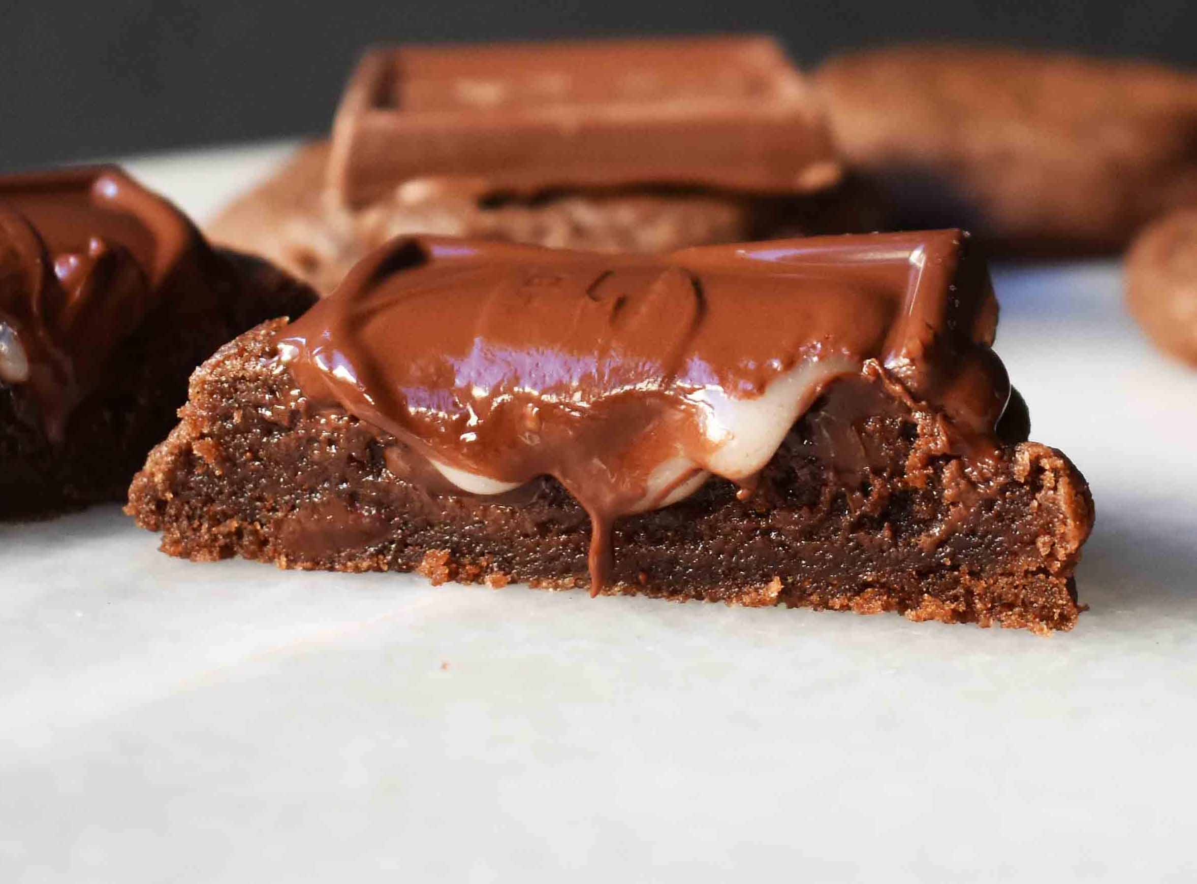 Ghirardelli Squares Chocolate Cookies. Double Chocolate Cookies topped with a creamy Ghirardelli square chocolate. Milk Chocolate Caramel, Dark Chocolate Mint,or Peppermint Bark Ghirardelli Squares are placed on top of this decadent cookie. A crowd favorite!