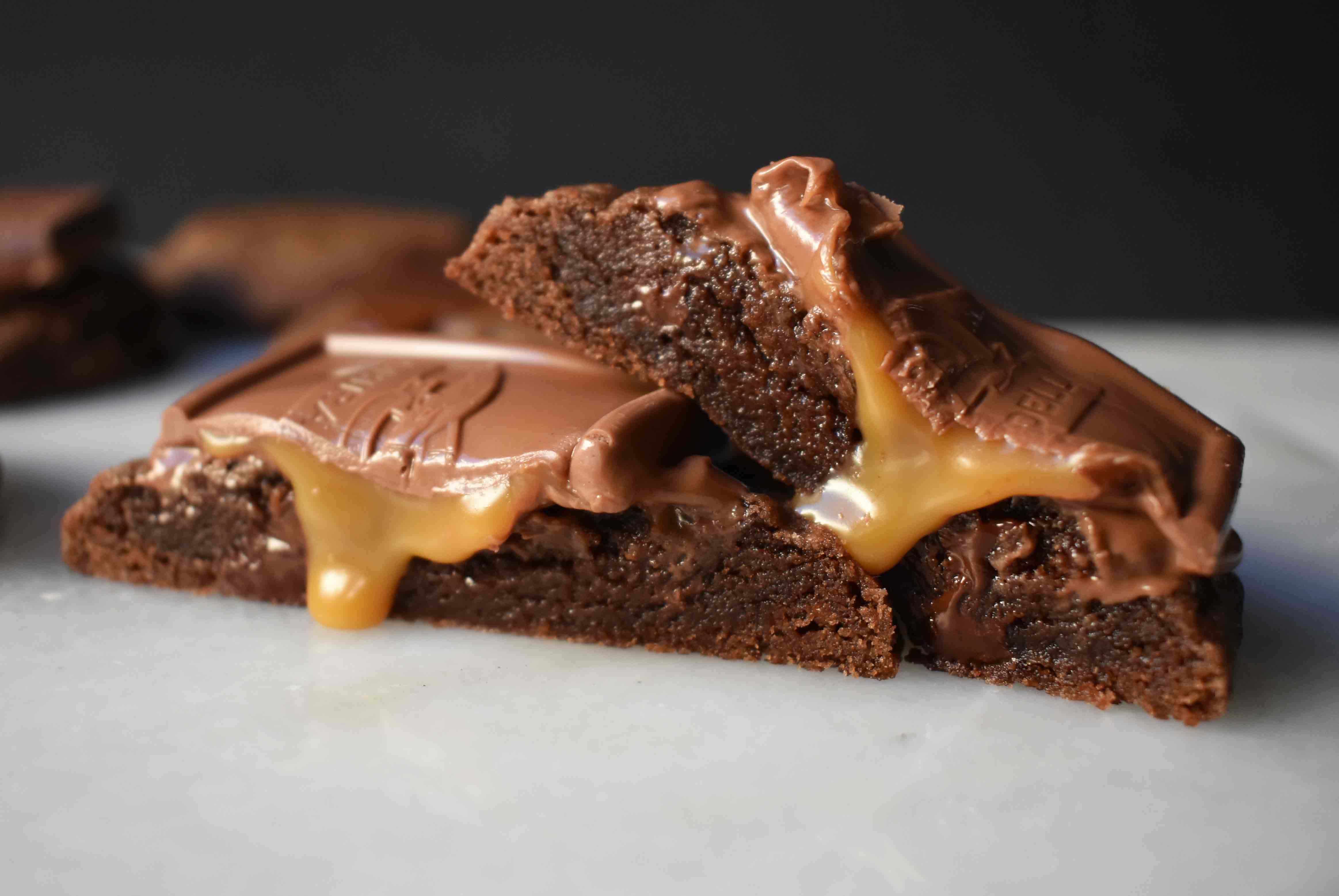 Ghirardelli Squares Chocolate Cookies. Double Chocolate Cookies topped with a creamy Ghirardelli square chocolate. Milk Chocolate Caramel, Dark Chocolate Mint,or Peppermint Bark Ghirardelli Squares are placed on top of this decadent cookie. A crowd favorite!