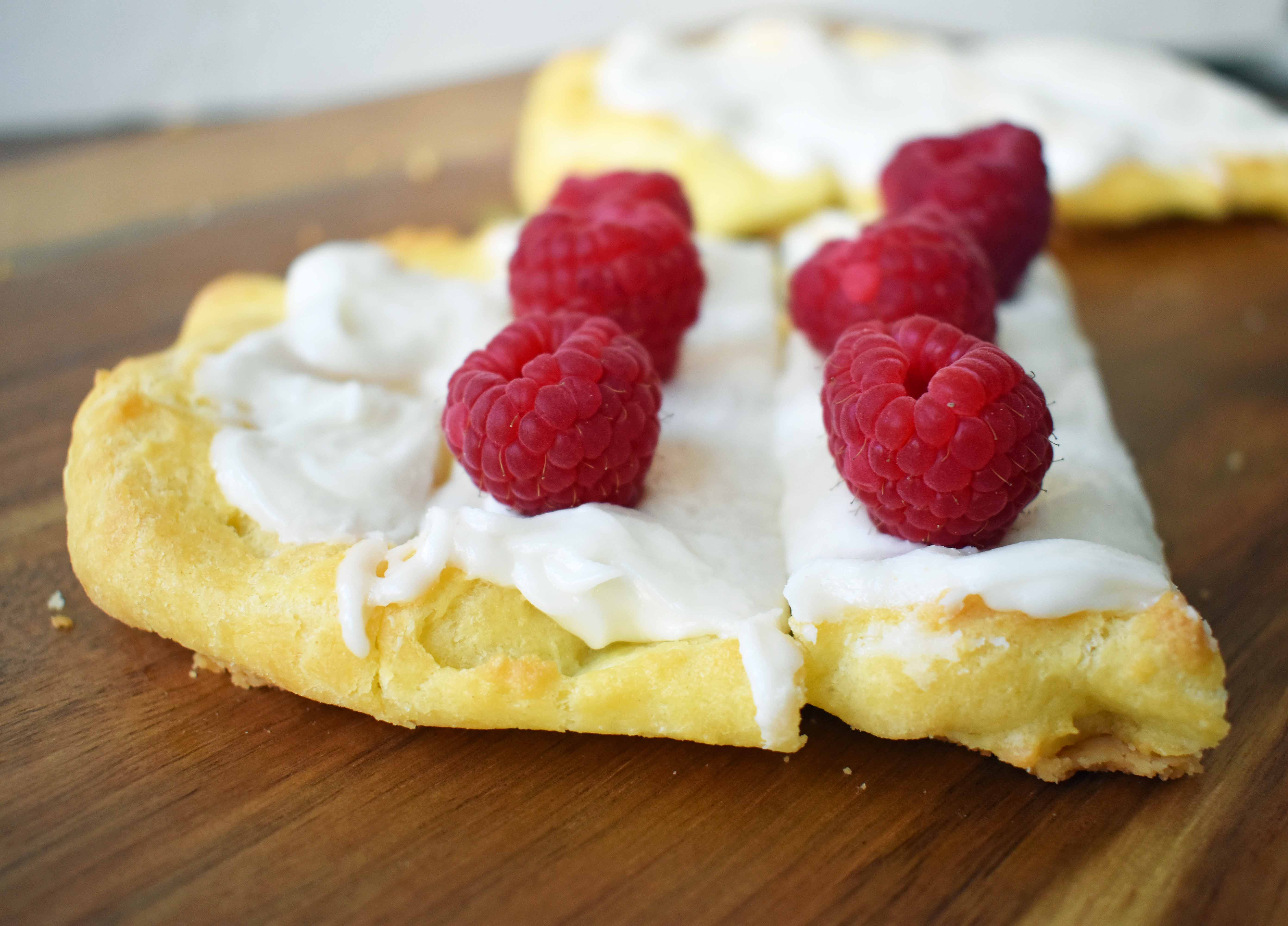 Swedish Pastry by Modern Honey. Buttery flaky layers with almond filling and topped with sweet cream frosting. A popular homemade European pastry.