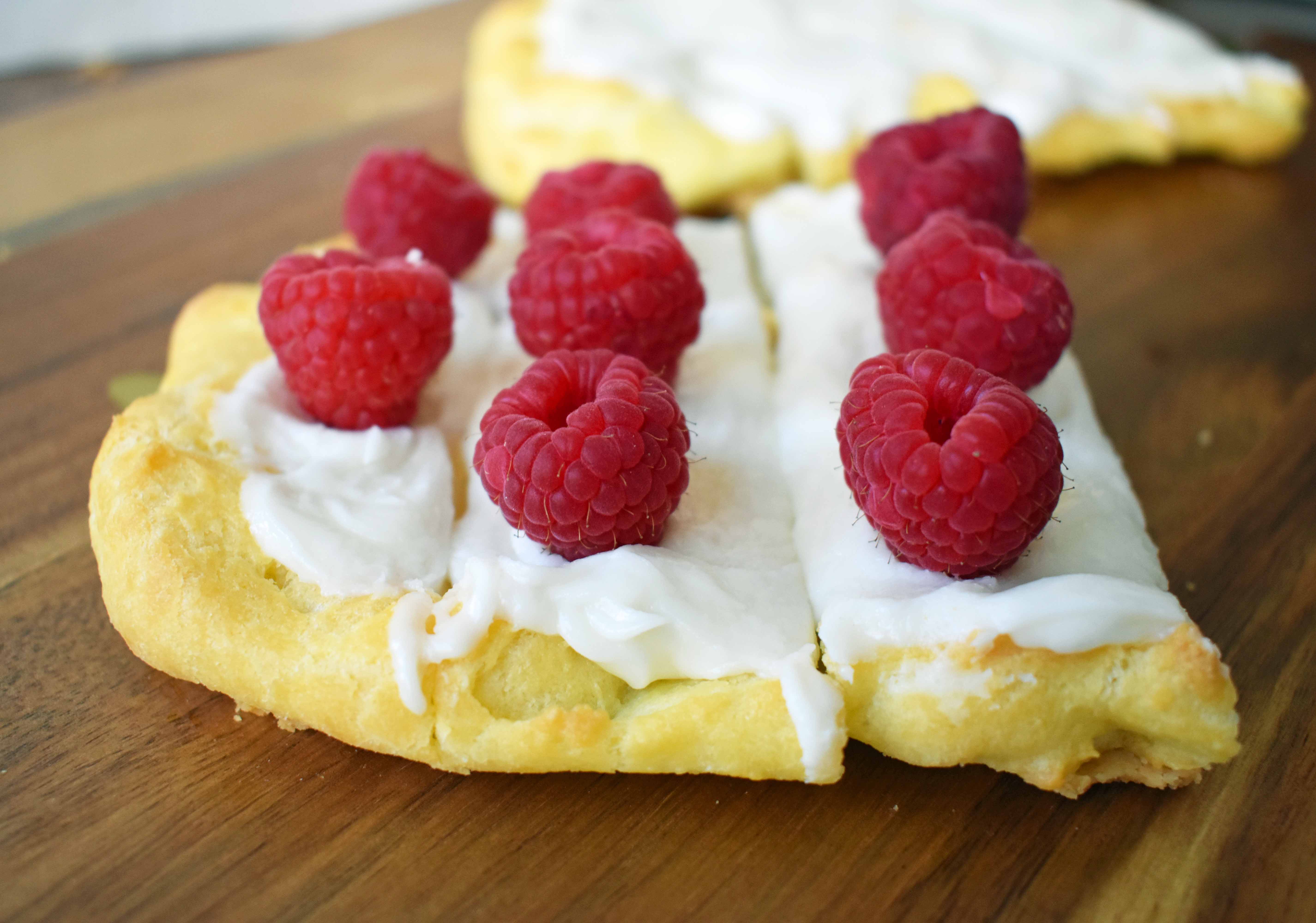 Swedish Pastry by Modern Honey. Buttery flaky layers with almond filling and topped with sweet cream frosting. A popular homemade European pastry. 