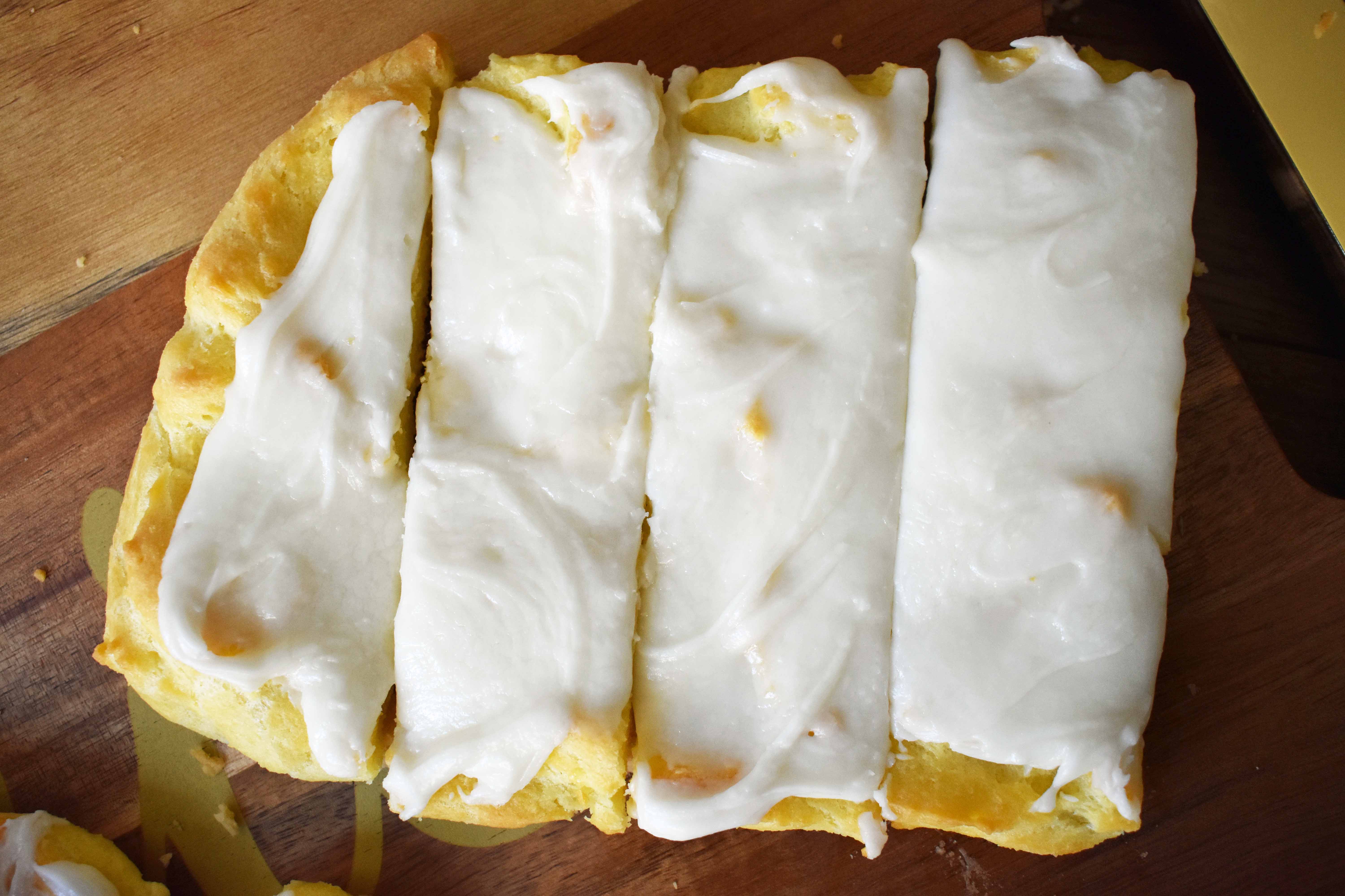 Swedish Pastry by Modern Honey. Buttery flaky layers with almond filling and topped with sweet cream frosting. A popular homemade European pastry. 