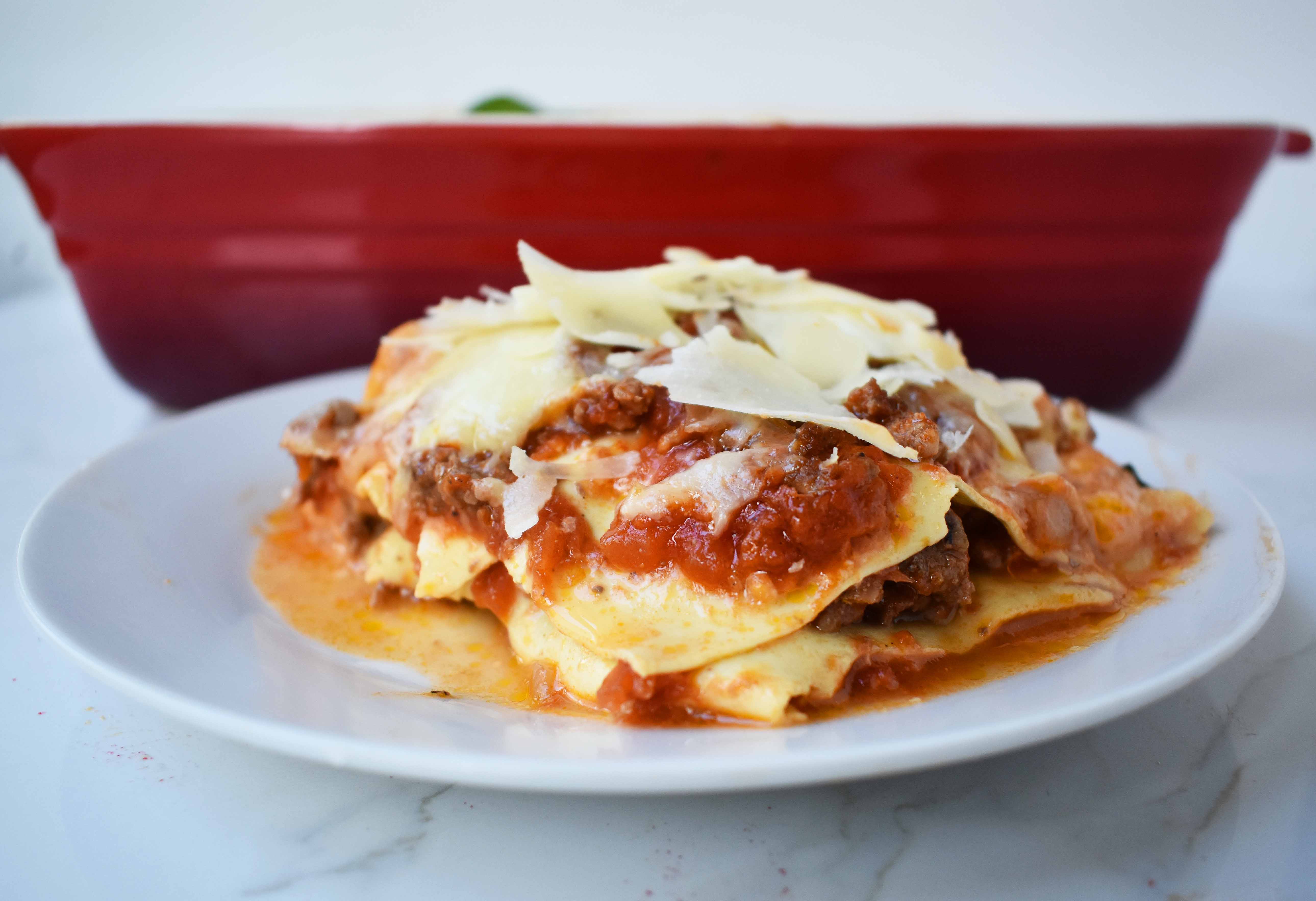 Italian Bolognese Lasagna. Authentic Italian recipe made with a traditional meat sauce, a creamy bechamel sauce, parmesan and mozzarella cheeses. 