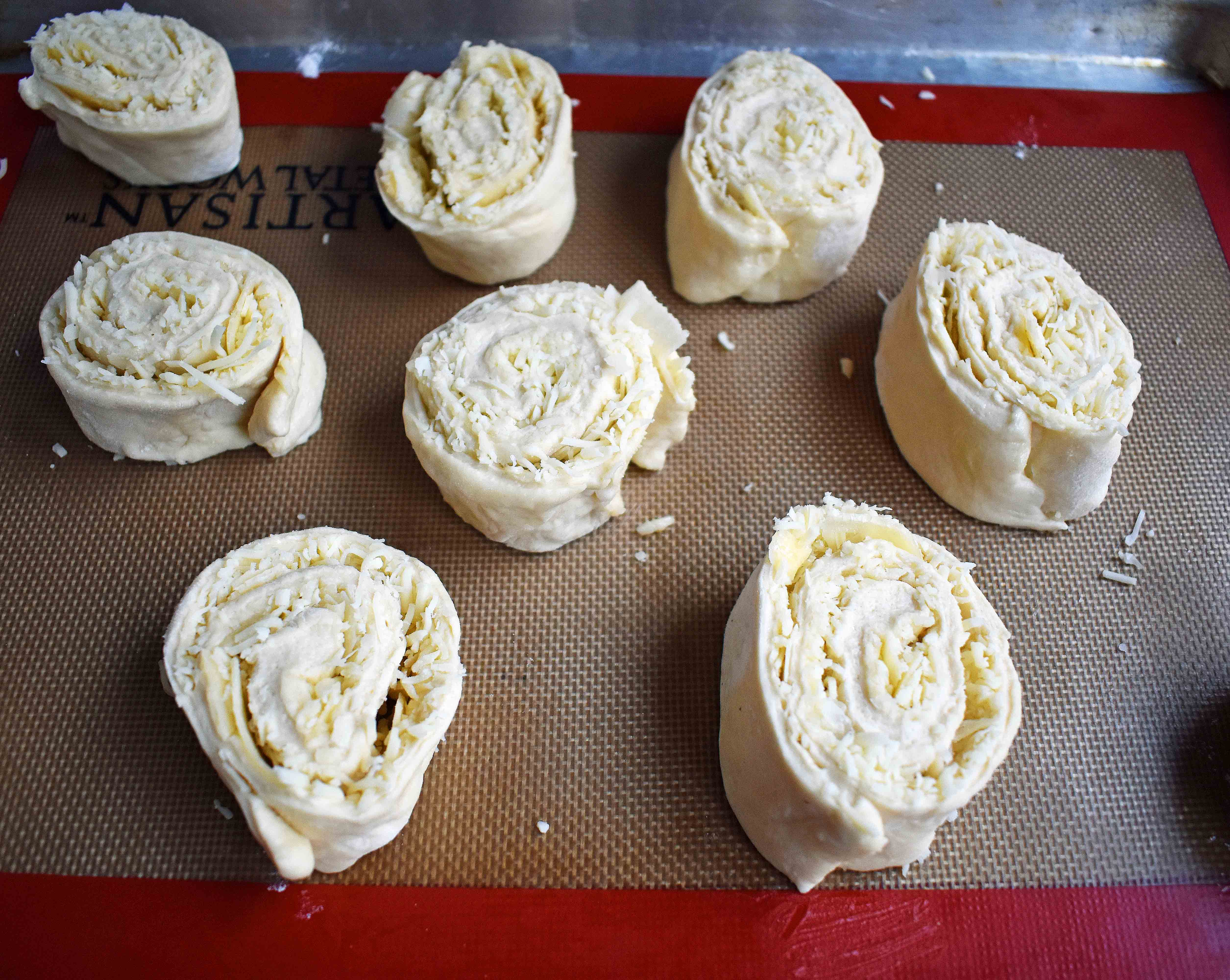 Golden's Garlic Parmesan Cheese Rolls by Modern Honey. Made with 5 simple ingredients -- pizza dough, butter, garlic powder, parmesan and mozzarella cheese. 